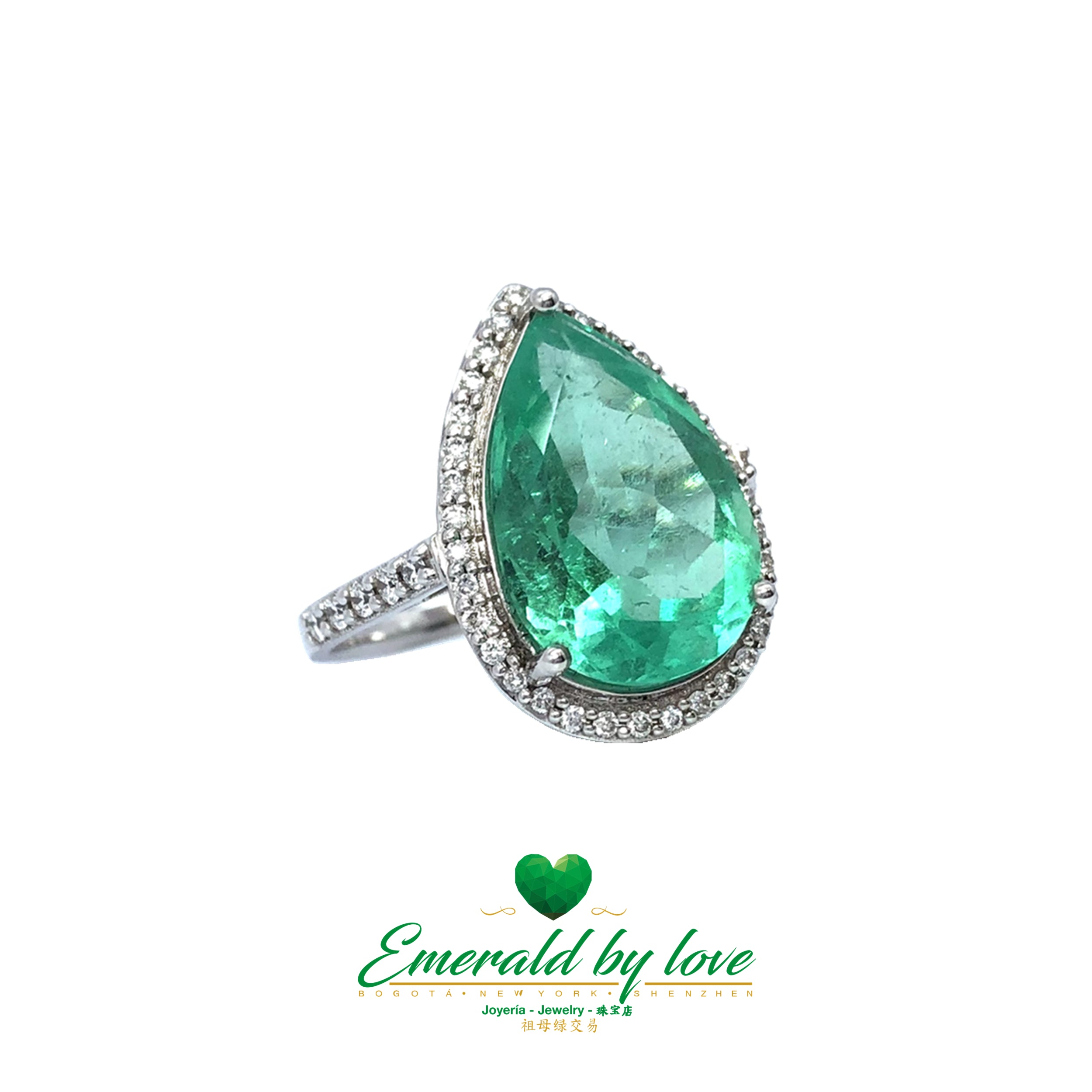 Sparkling Teardrop Halo Colombian Emerald Ring in 18k White Gold