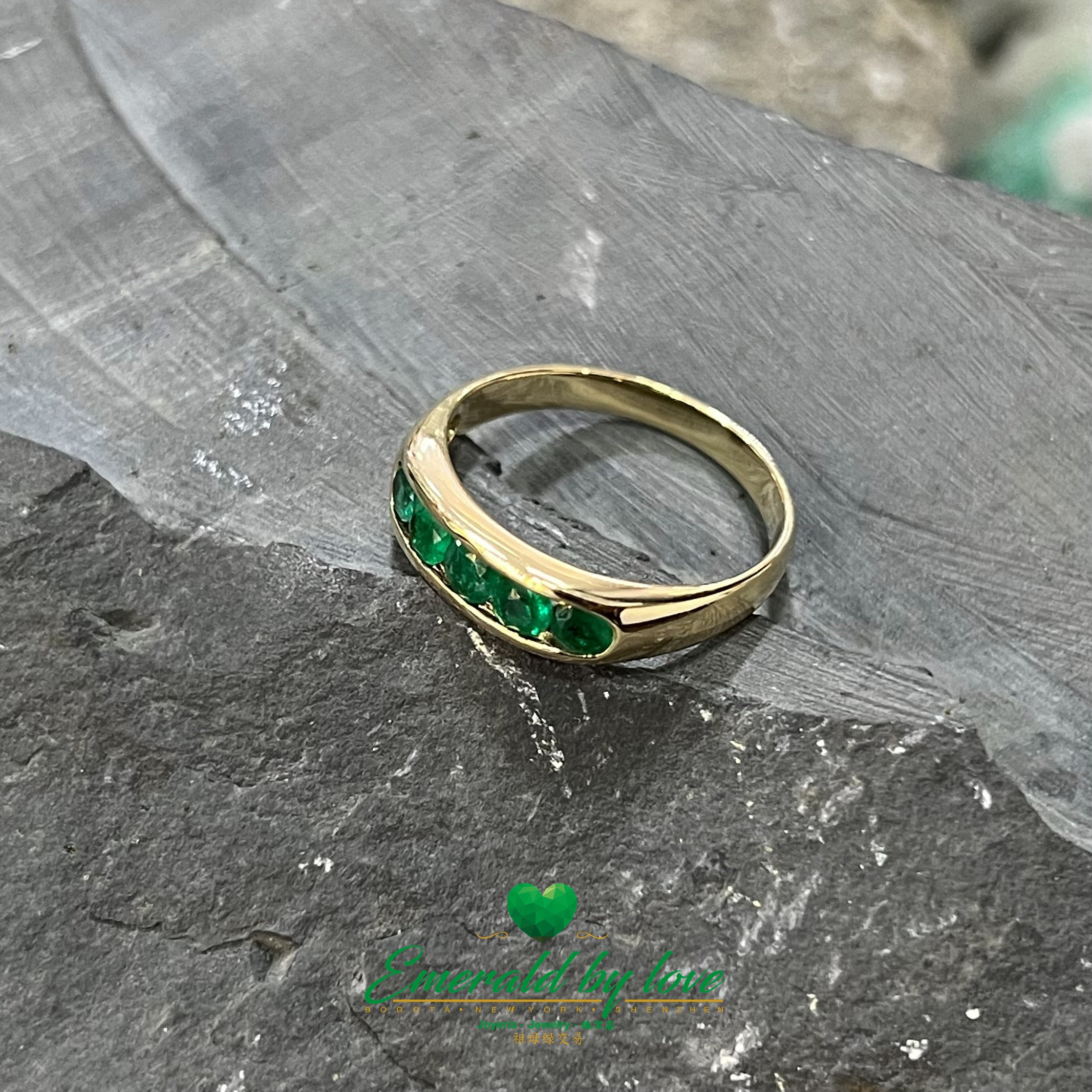 Yellow Gold Round Emerald Band: Timeless Elegance