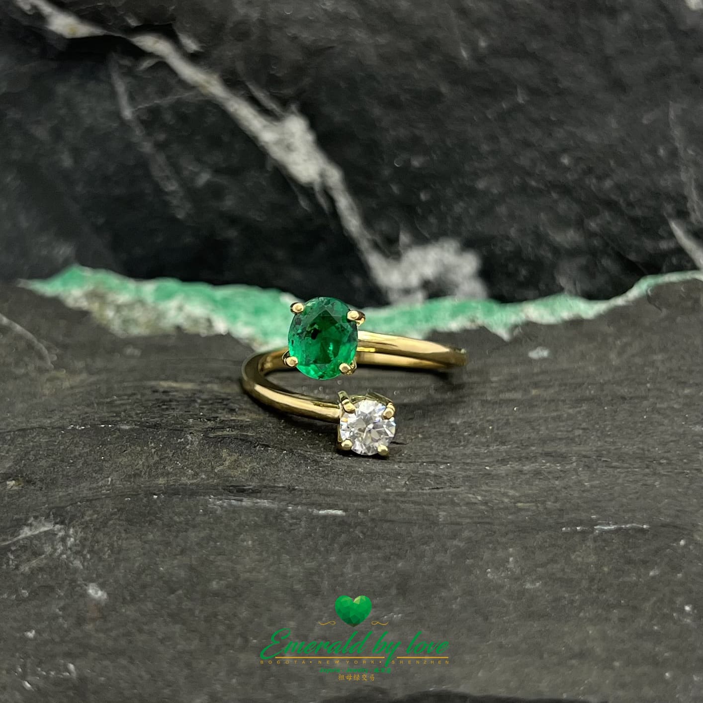 Oval Emerald and Round Diamond Yellow Gold Ring