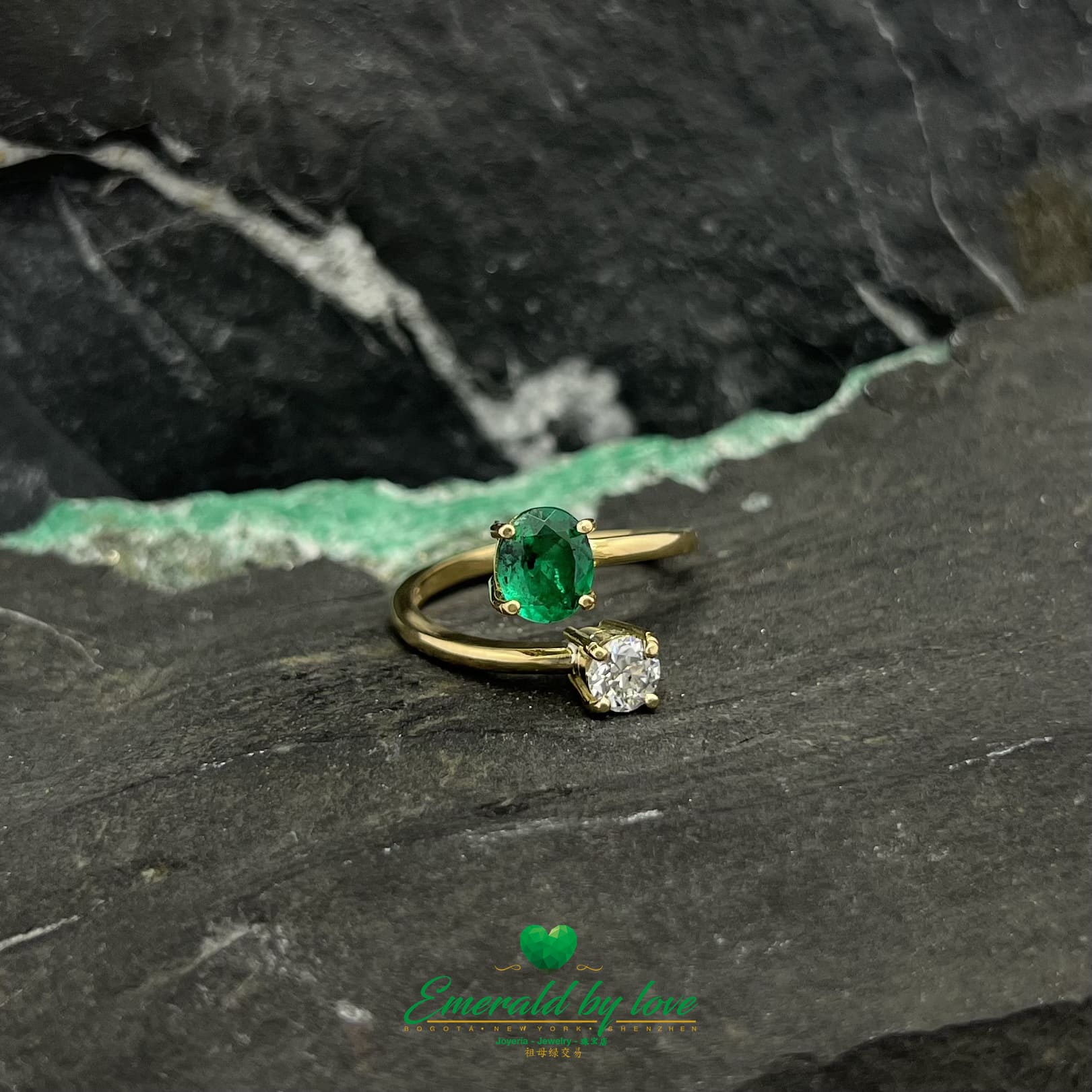 Oval Emerald and Round Diamond Yellow Gold Ring