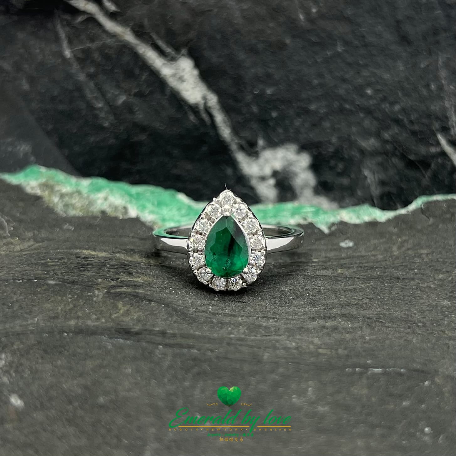 White Gold Tear-Shaped Marquise Emerald Ring with Diamond Halo