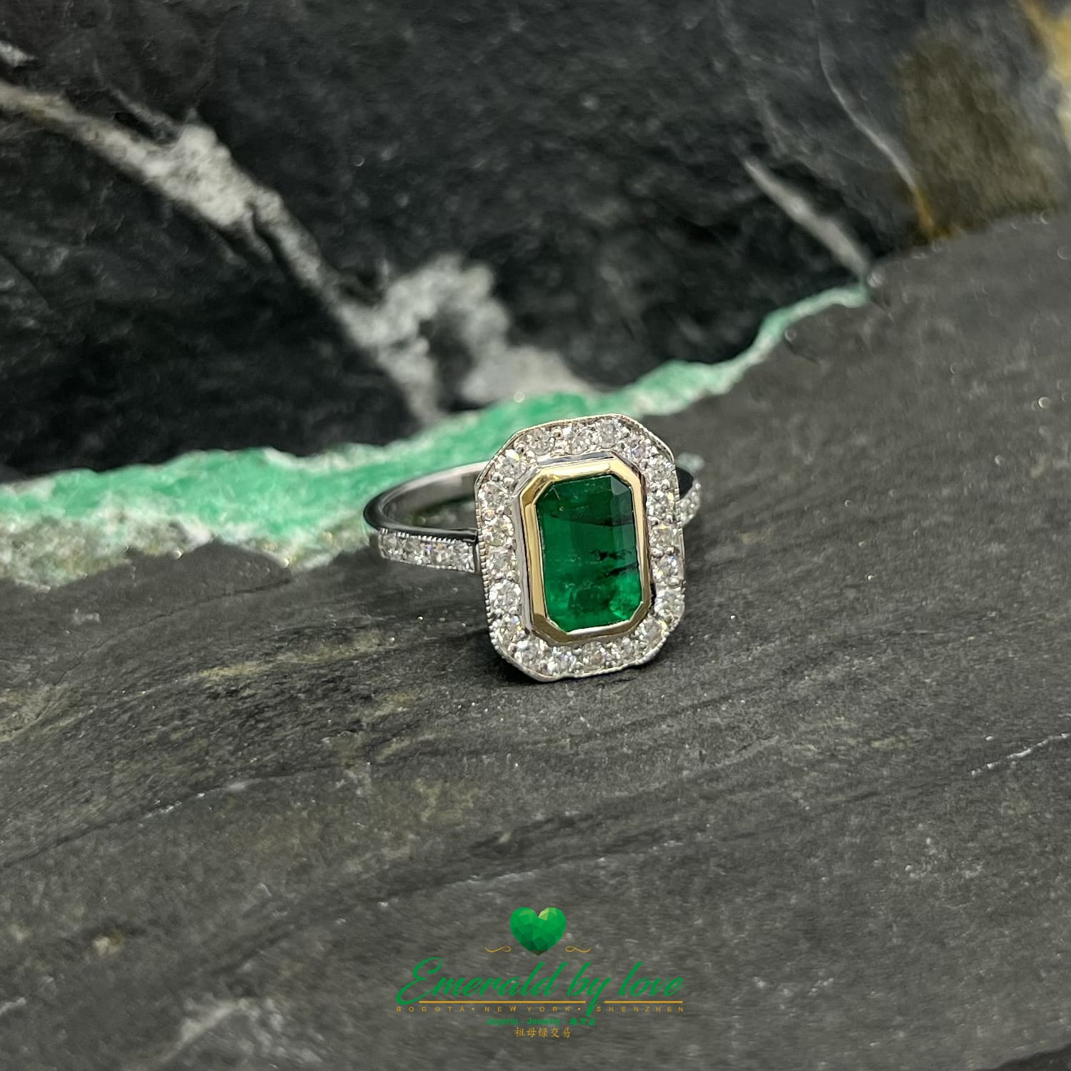 Rectangular Emerald Bezel Set Ring with Diamond Halo in White Gold