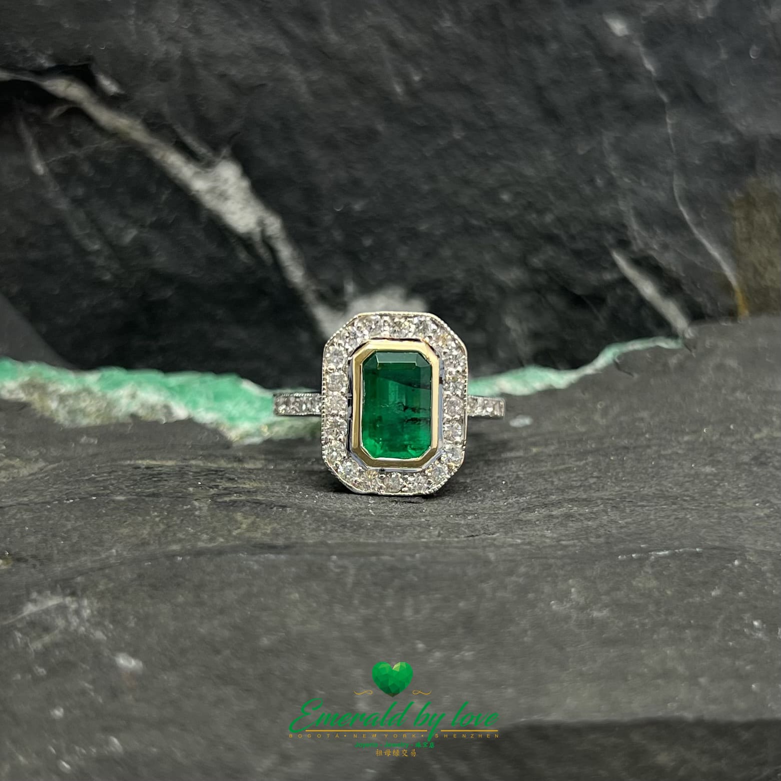 Rectangular Emerald Bezel Set Ring with Diamond Halo in White Gold