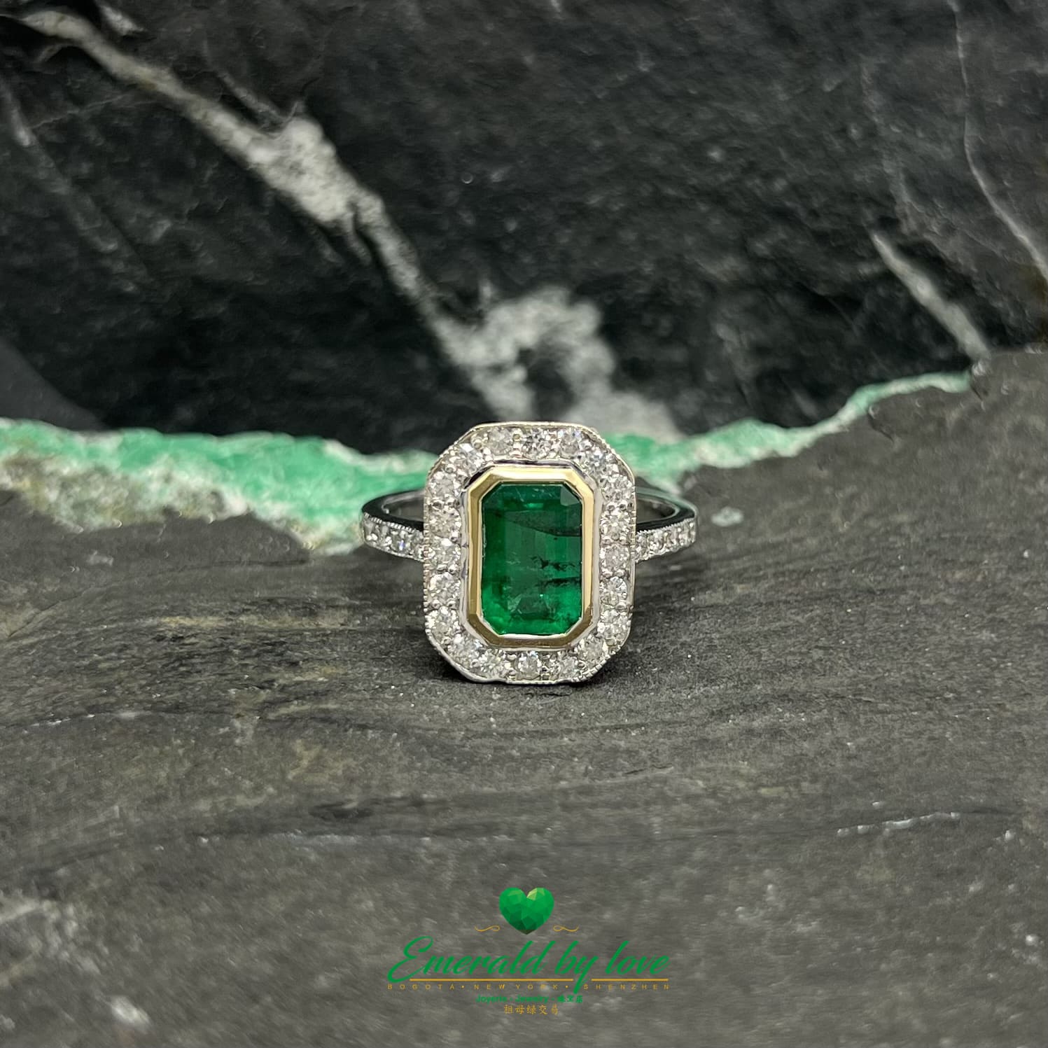 Rectangular Emerald Bezel Set Ring with Diamond Halo in White Gold