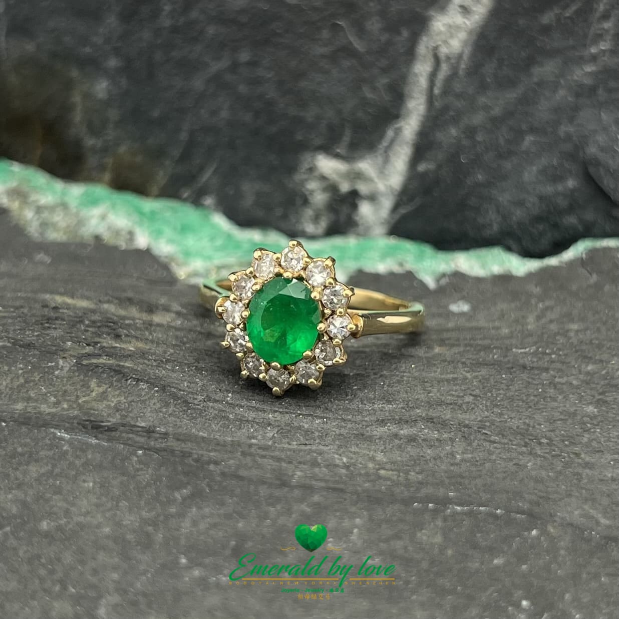 Majestic Blossom: Yellow Gold Marquise Flower Ring with Oval Emerald and Diamond Halo
