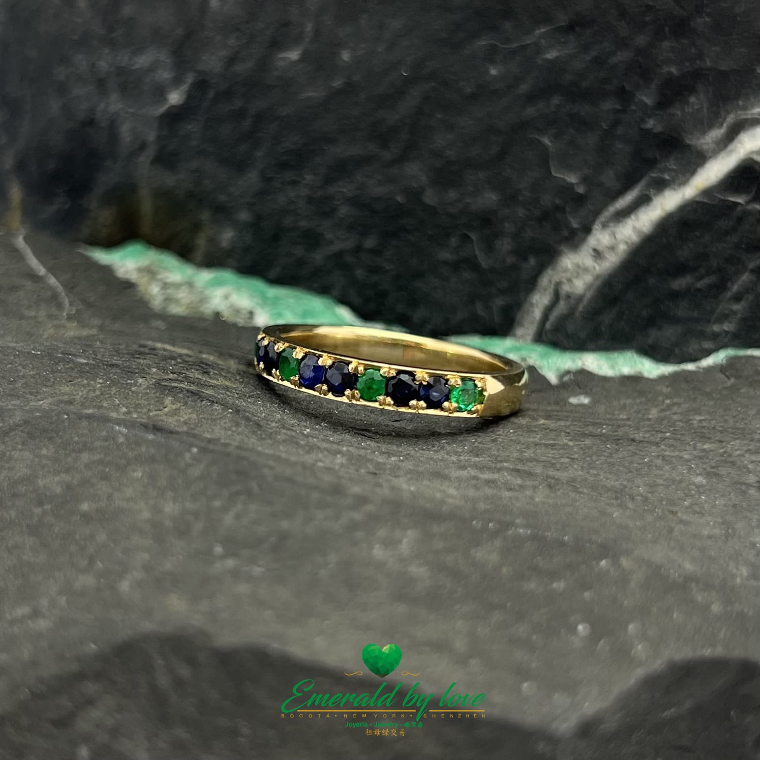 Golden Symphony: Yellow Gold Band with Emeralds and Sapphires