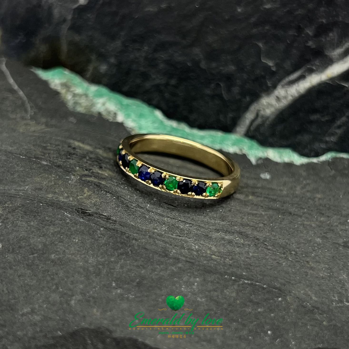 Golden Symphony: Yellow Gold Band with Emeralds and Sapphires