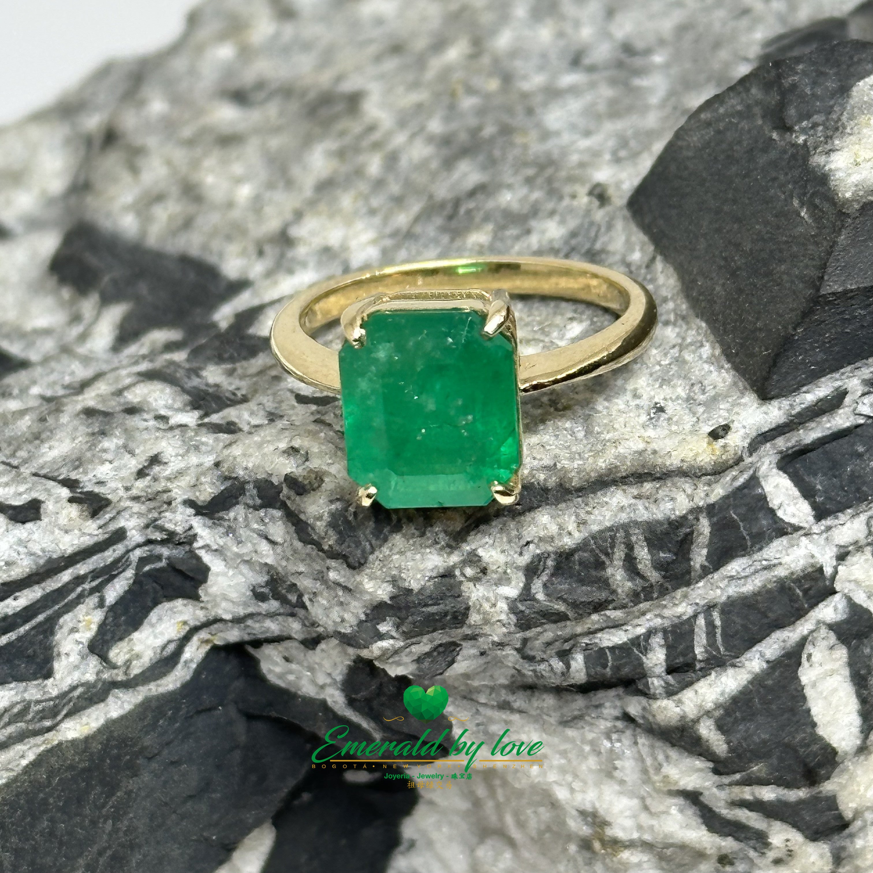 Solitaire Ring with Emerald-Cut Colombian Emerald and Four-Prong Setting