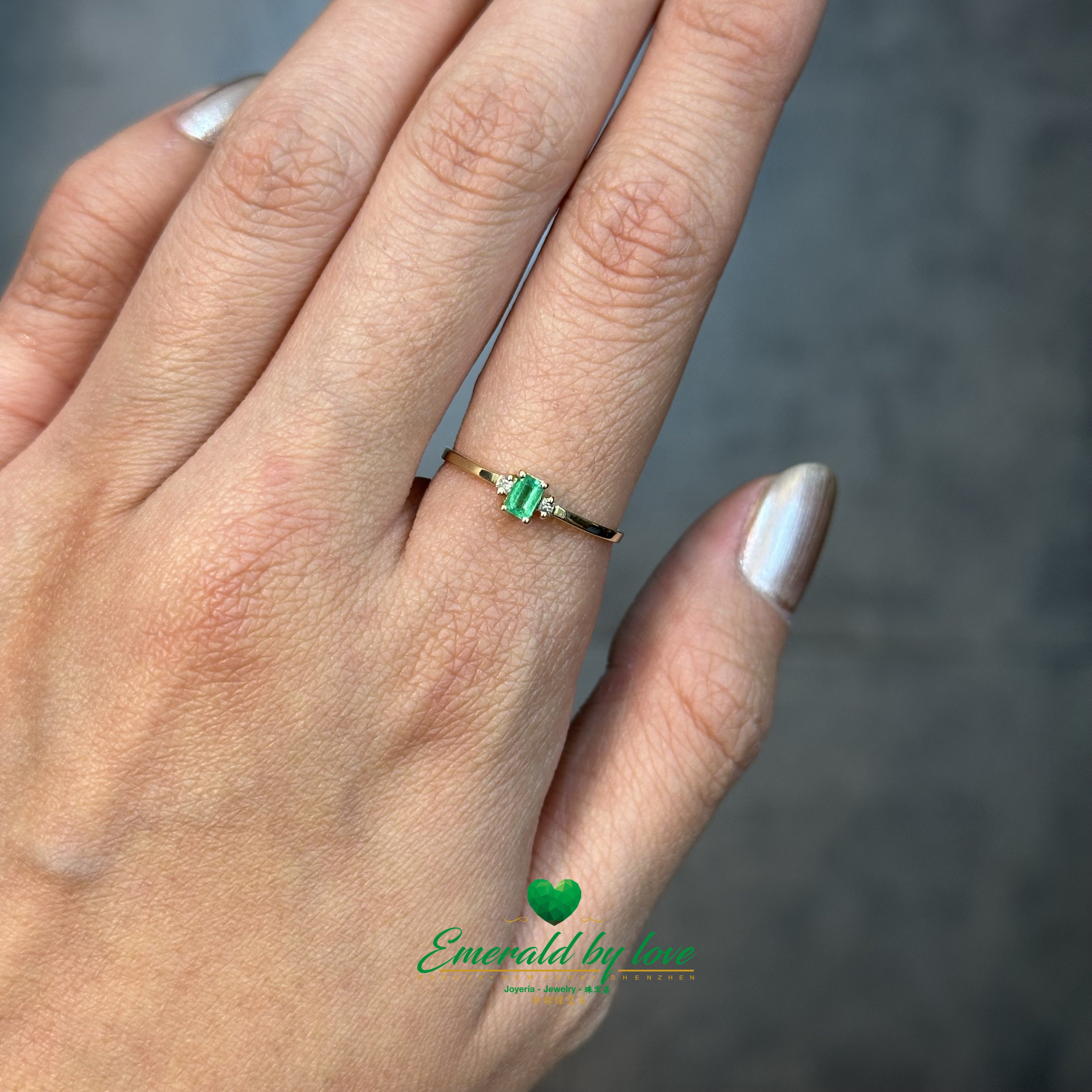 Delicate Thin Ring with Rectangular Emerald and Diamond Accents