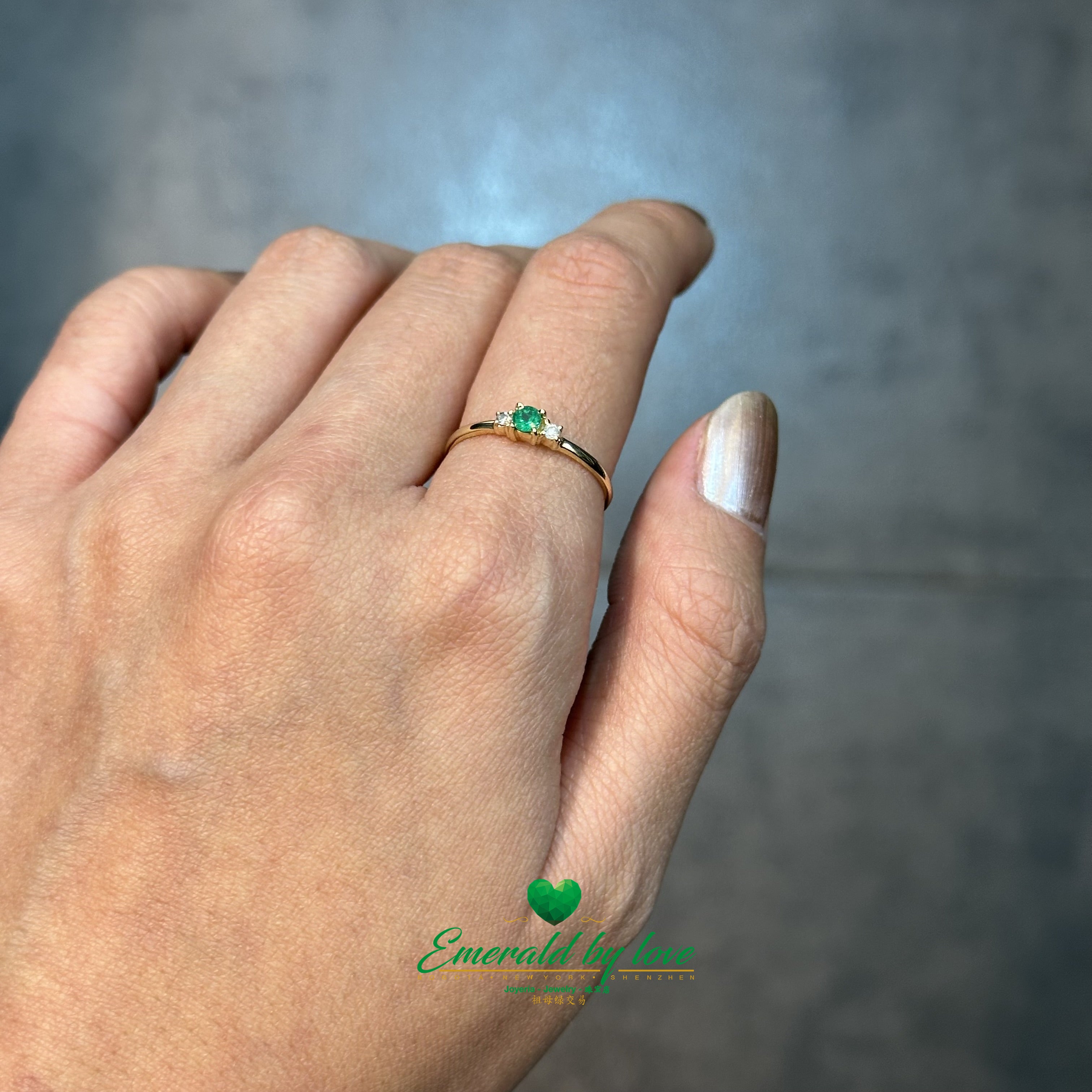 Slim Delicate Ring with Central Round Emerald and Diamond Accents