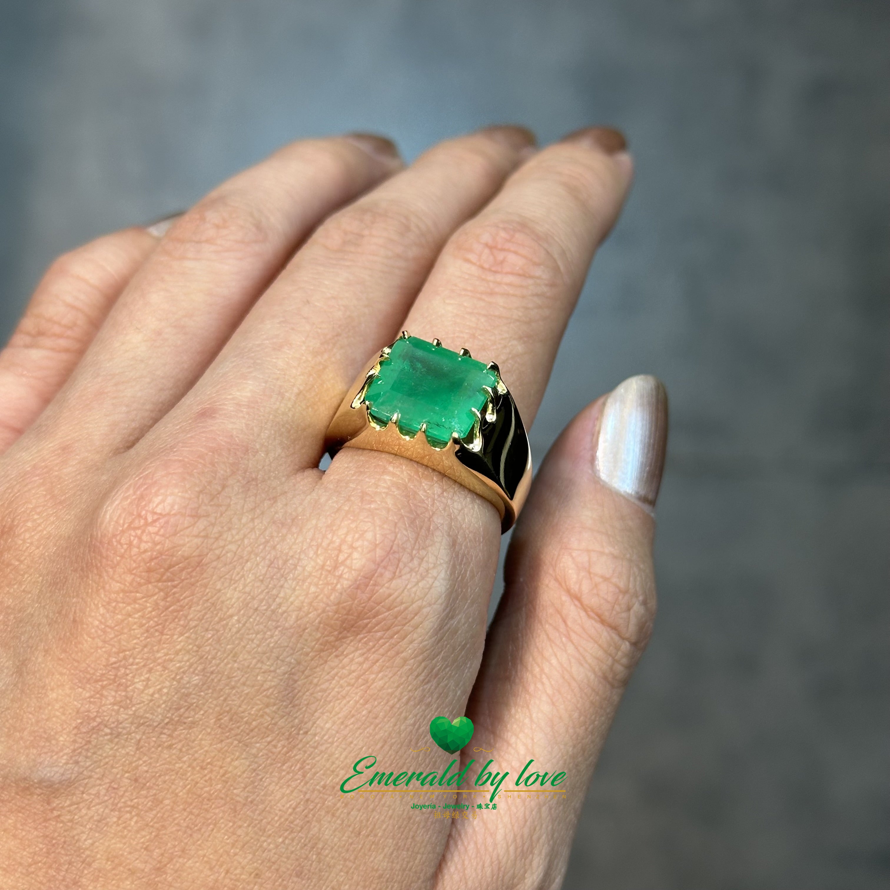 Unisex Yellow Gold Ring with Large Rectangular Emerald in Multi-Prong Setting