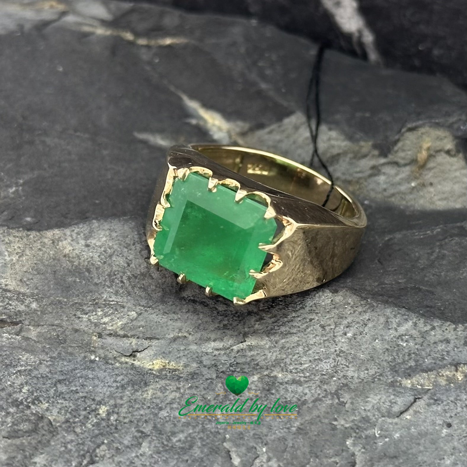 Unisex Yellow Gold Ring with Large Rectangular Emerald in Multi-Prong Setting