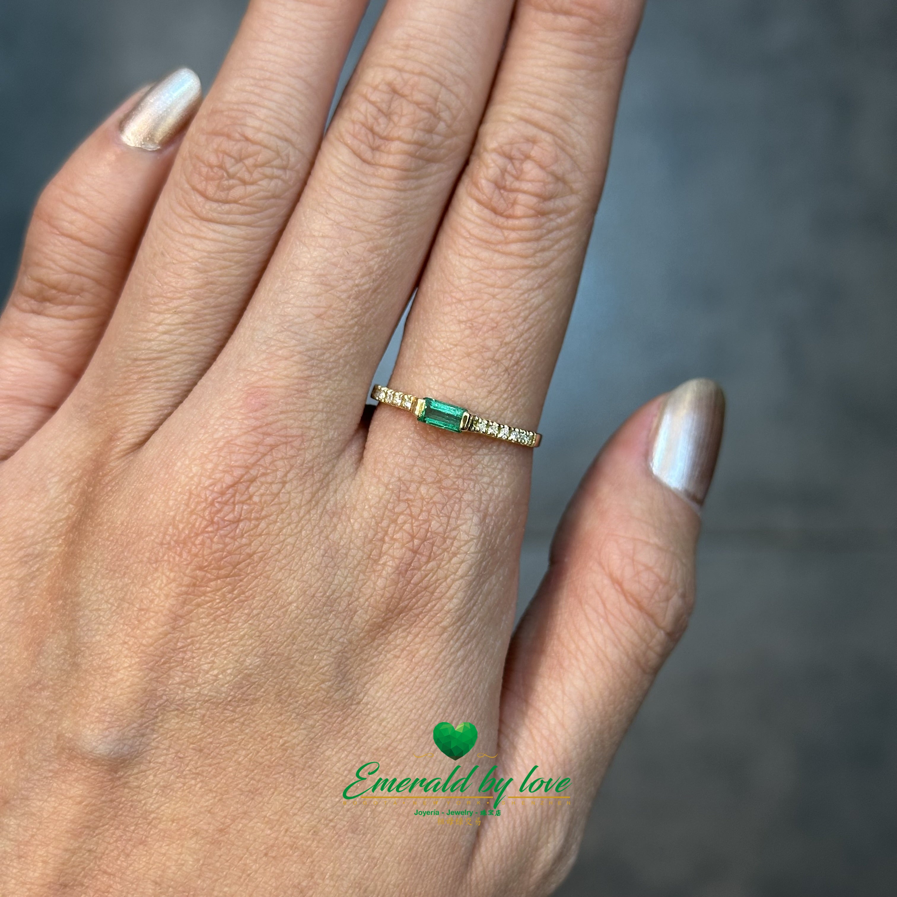 Slim Ring with Horizontal Baguette Emerald and Diamond-Studded Band