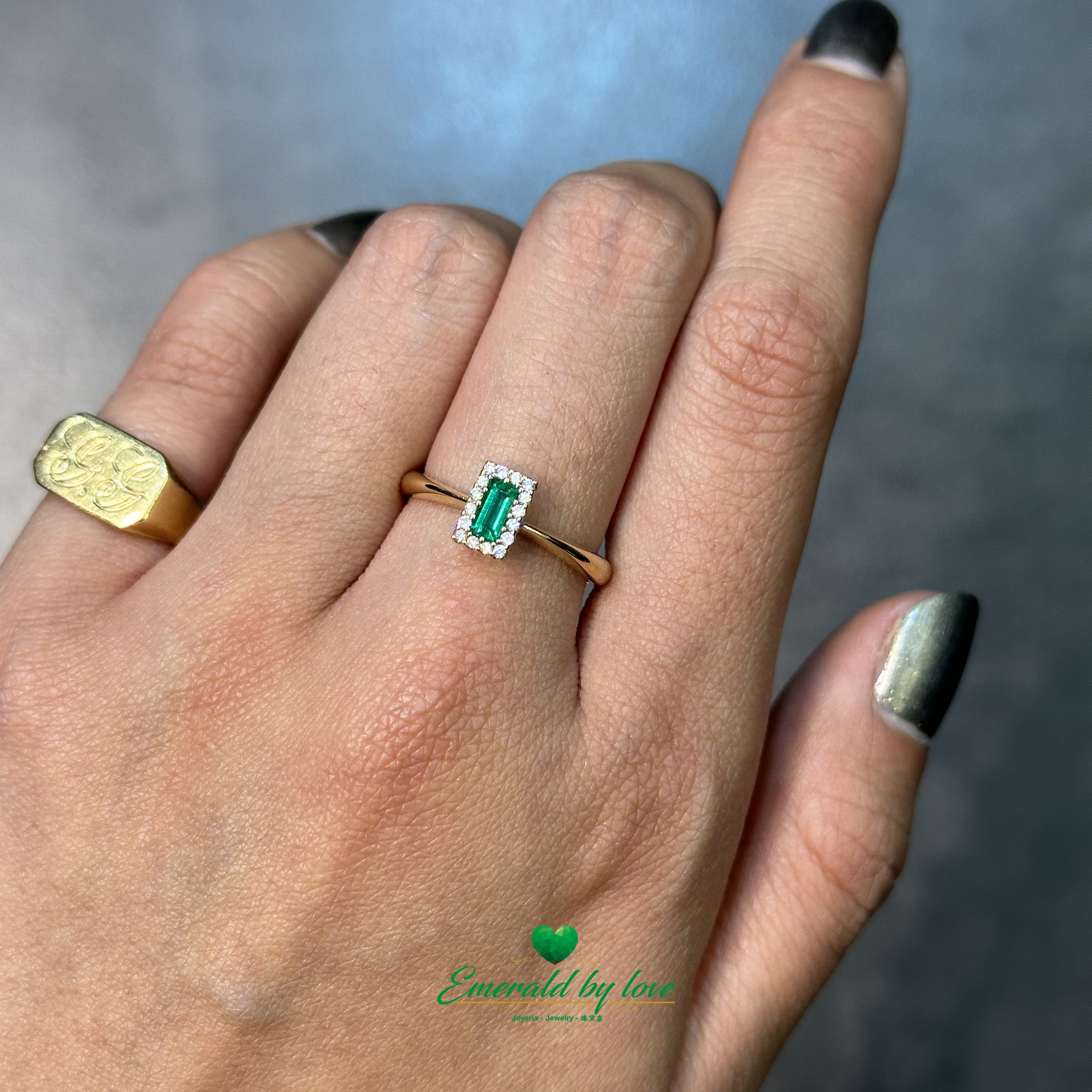 Yellow Gold Cluster Ring with Baguette Emerald Surrounded by Diamonds