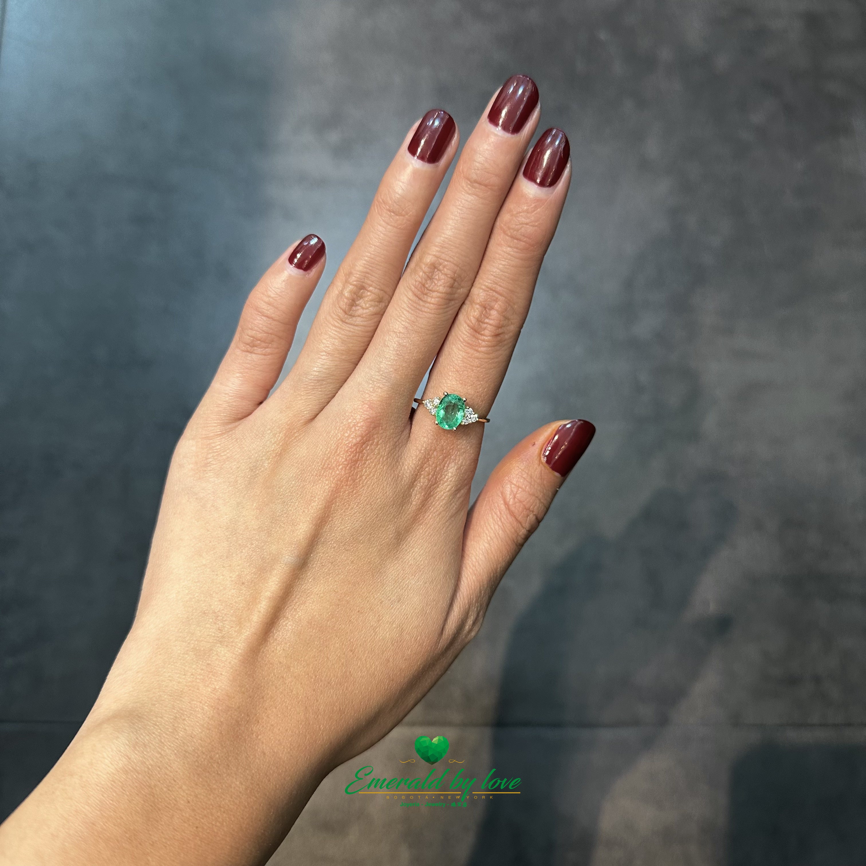 Verde Brilliance – Oval Colombian Emerald Ring Framed by Diamonds