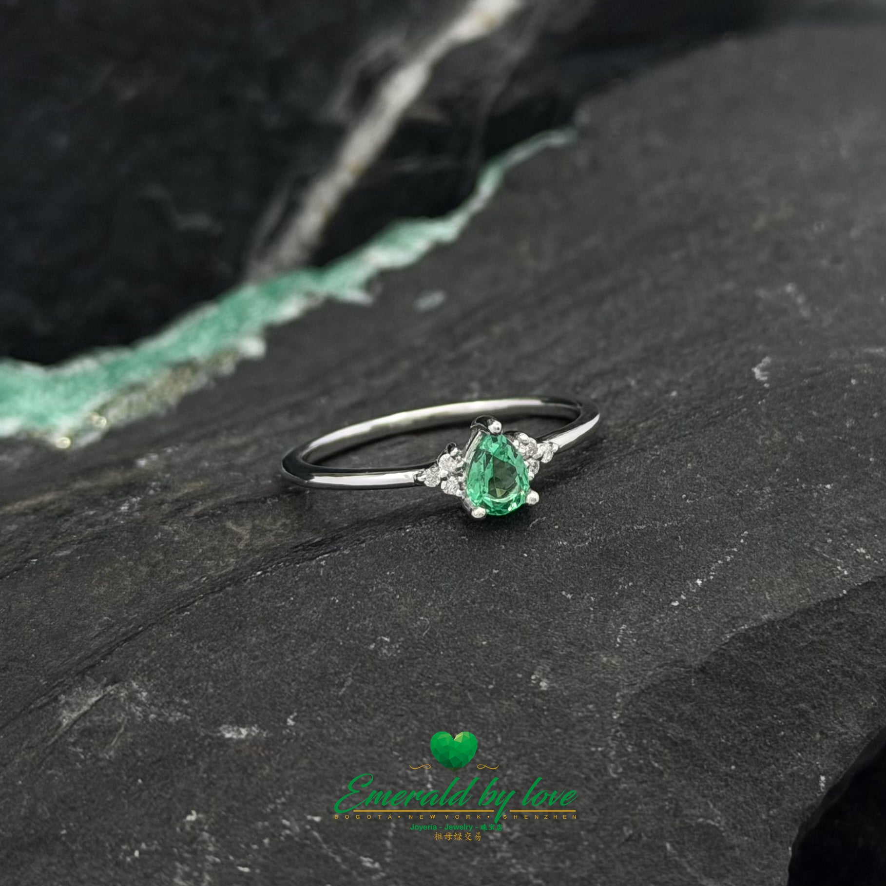 White Gold Pear Emerald Ring with Diamond Accents