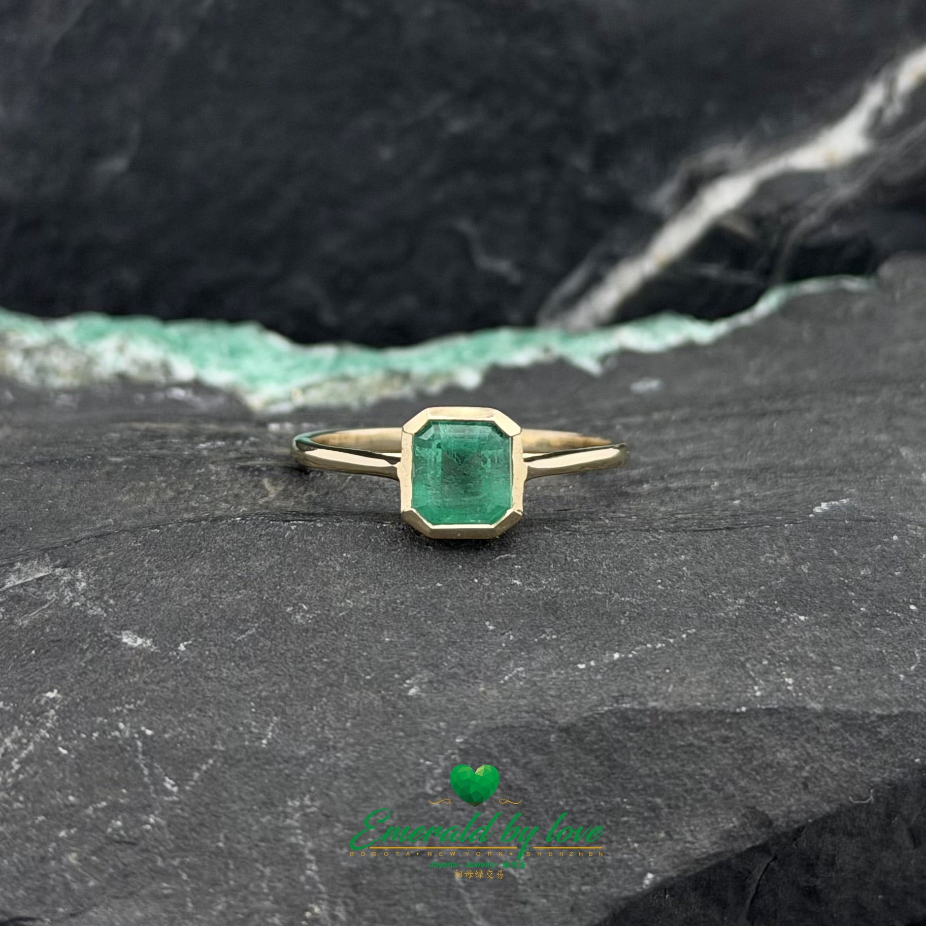 Emerald Engagement Ring with Half Bezel Setting and Diamond Band