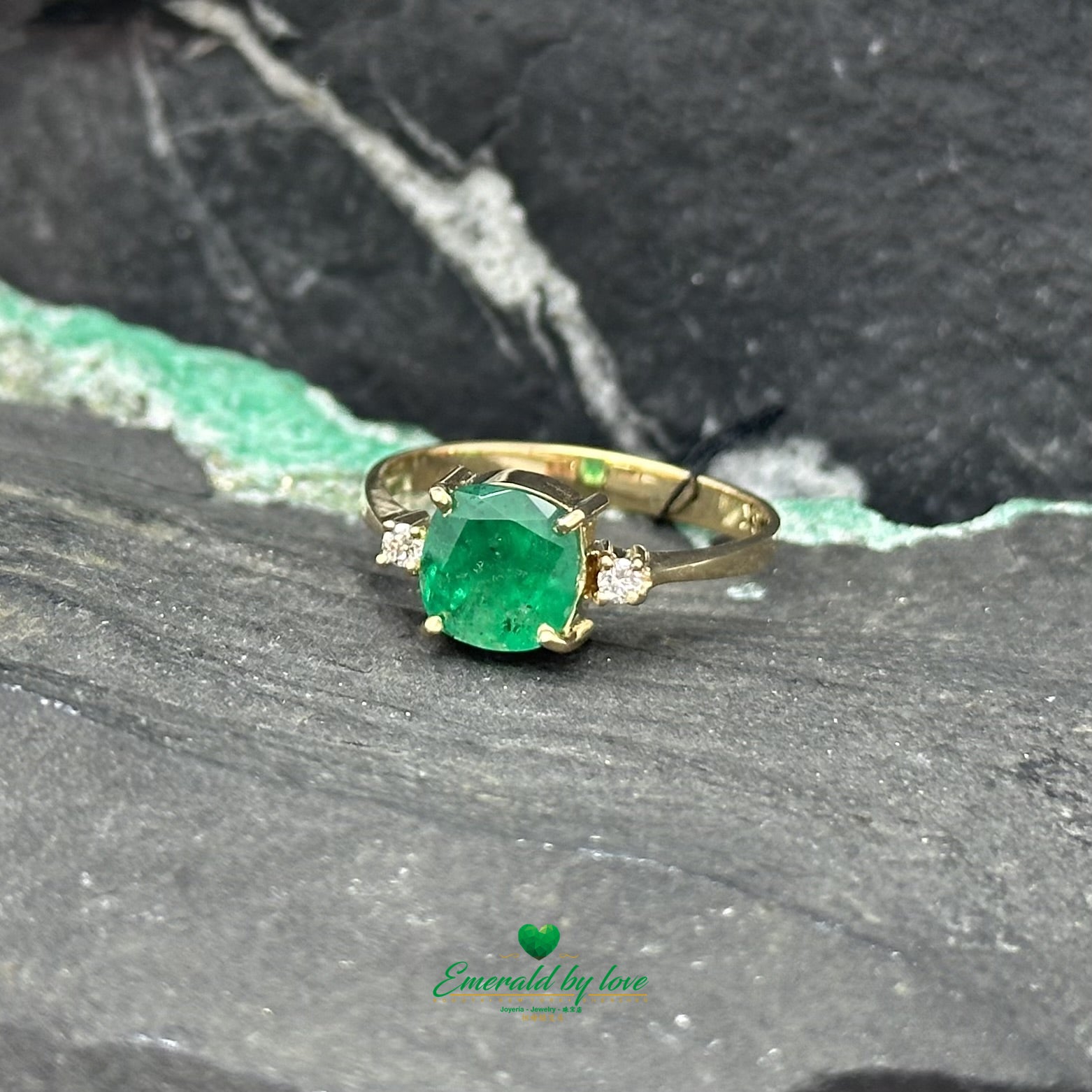 Masterpiece Yellow Gold Ring with Central Colombian Cushion-Cut Emerald and Side Diamonds