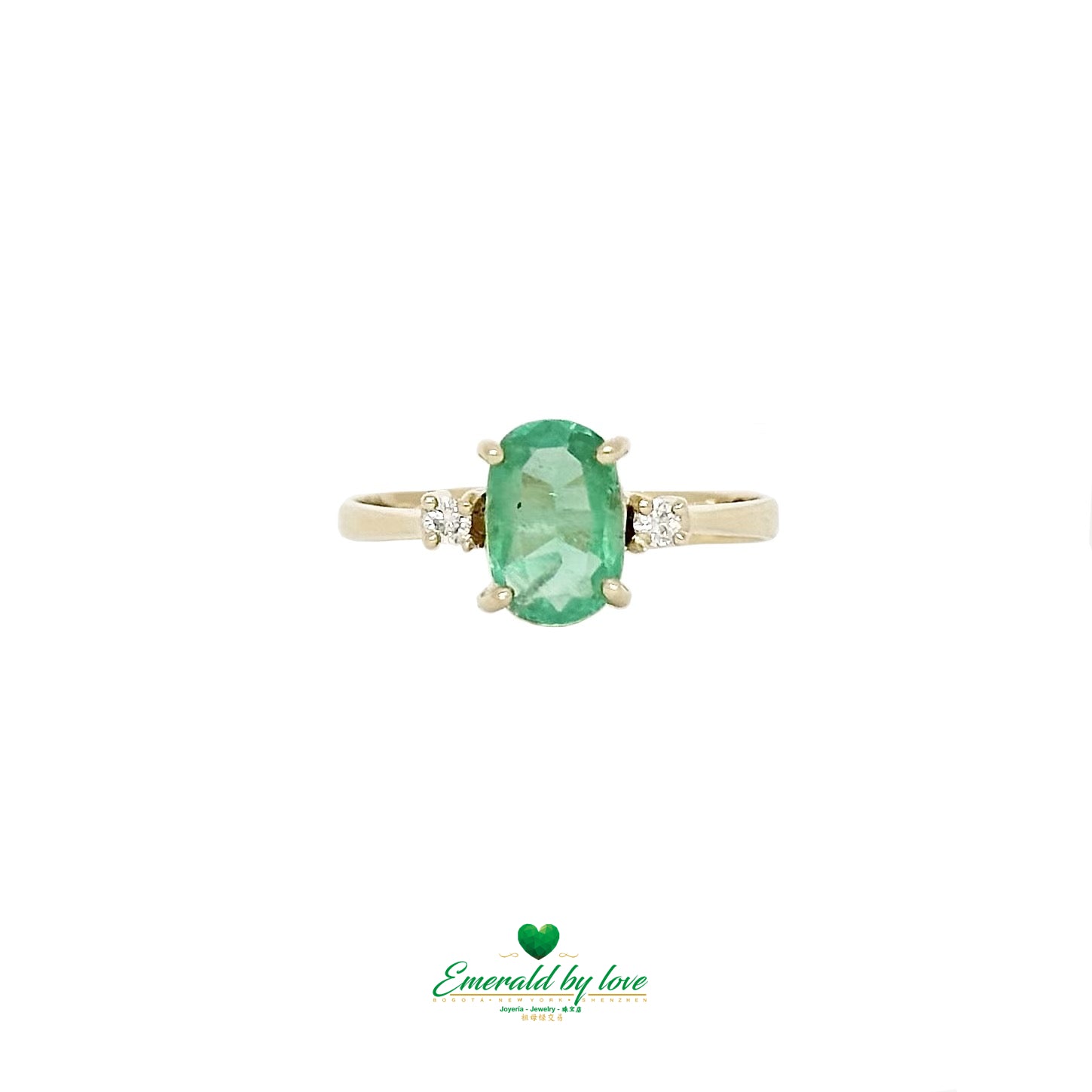 Refined ring with Oval Cut Crystal Emerald and Side Diamonds