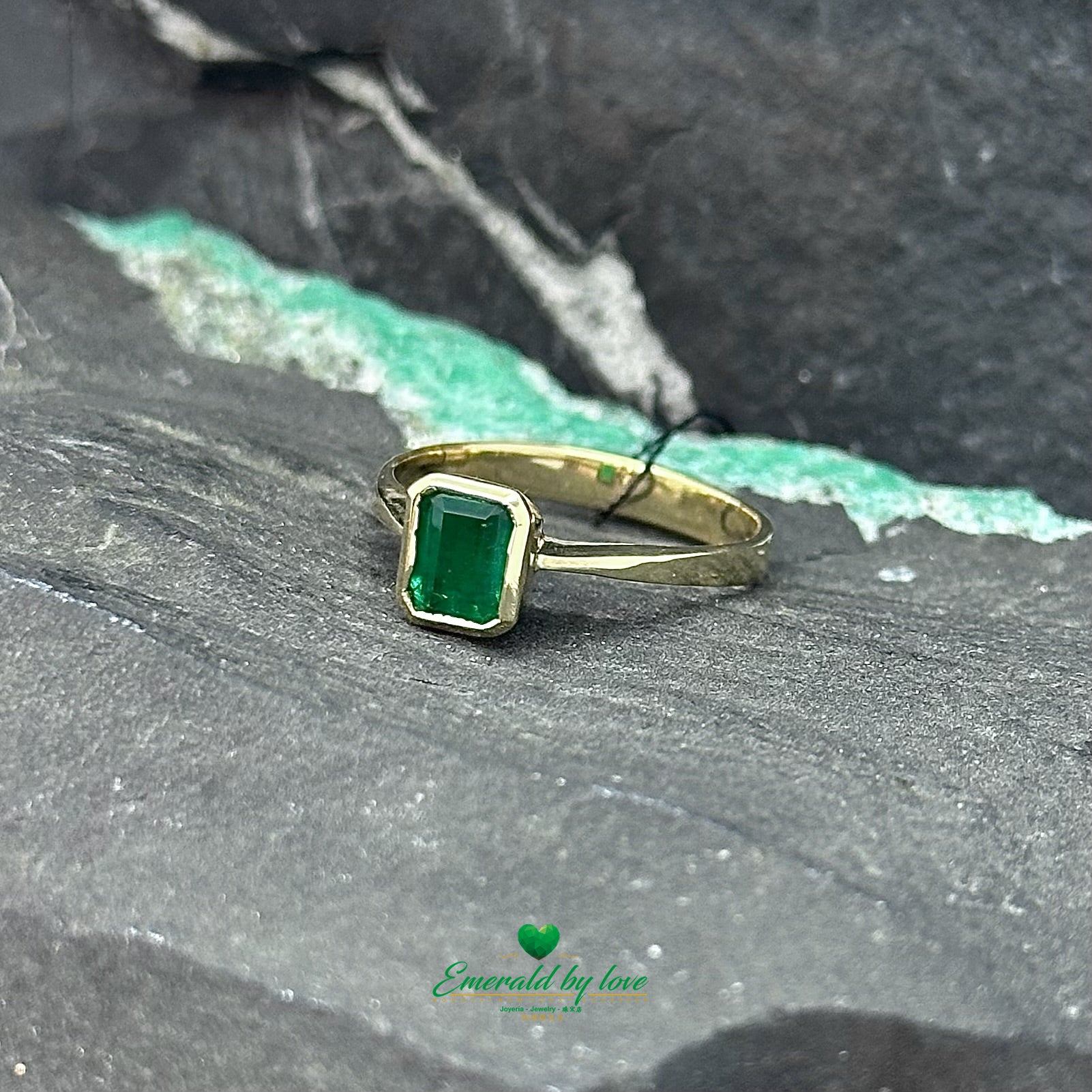 Delicate Yellow Gold Ring with Rectangular Colombian Emerald in Bezel Setting