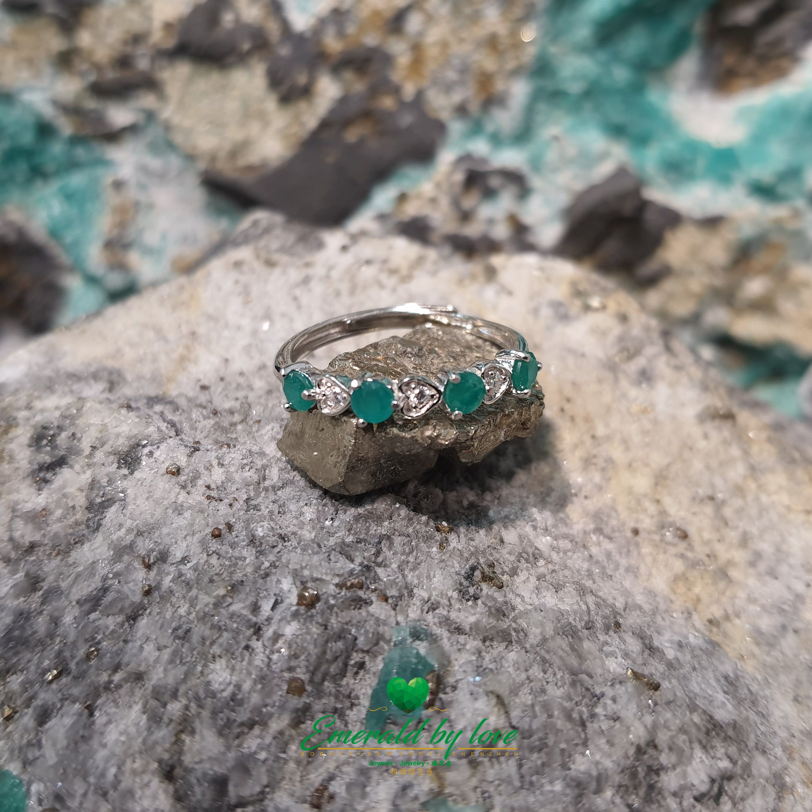 Interlocked Band Ring with Round Emeralds and Zirconia Hearts