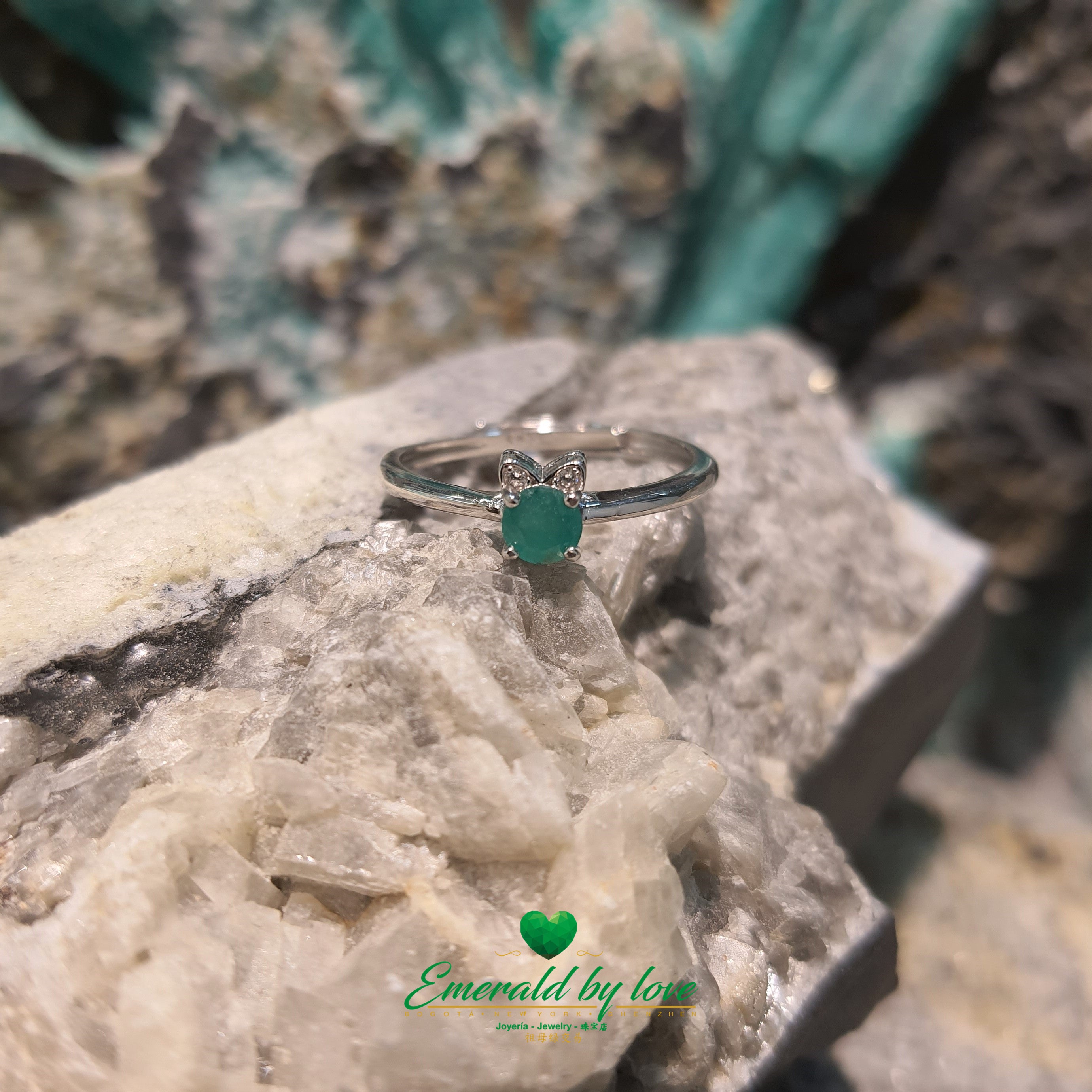 Solitaire Emerald Silver Ring with Cat Ear Design