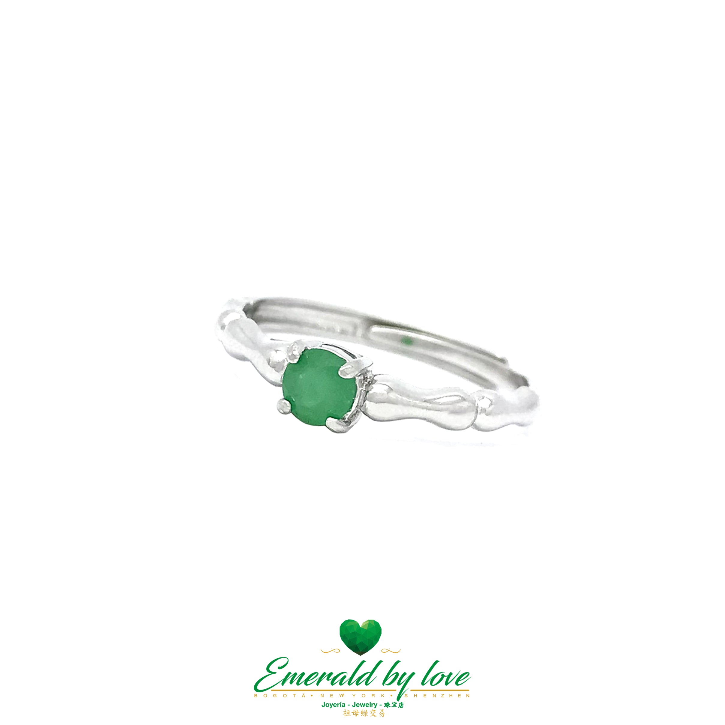 Round Emerald Solitaire Ring with Wavy Band: Timeless Elegance