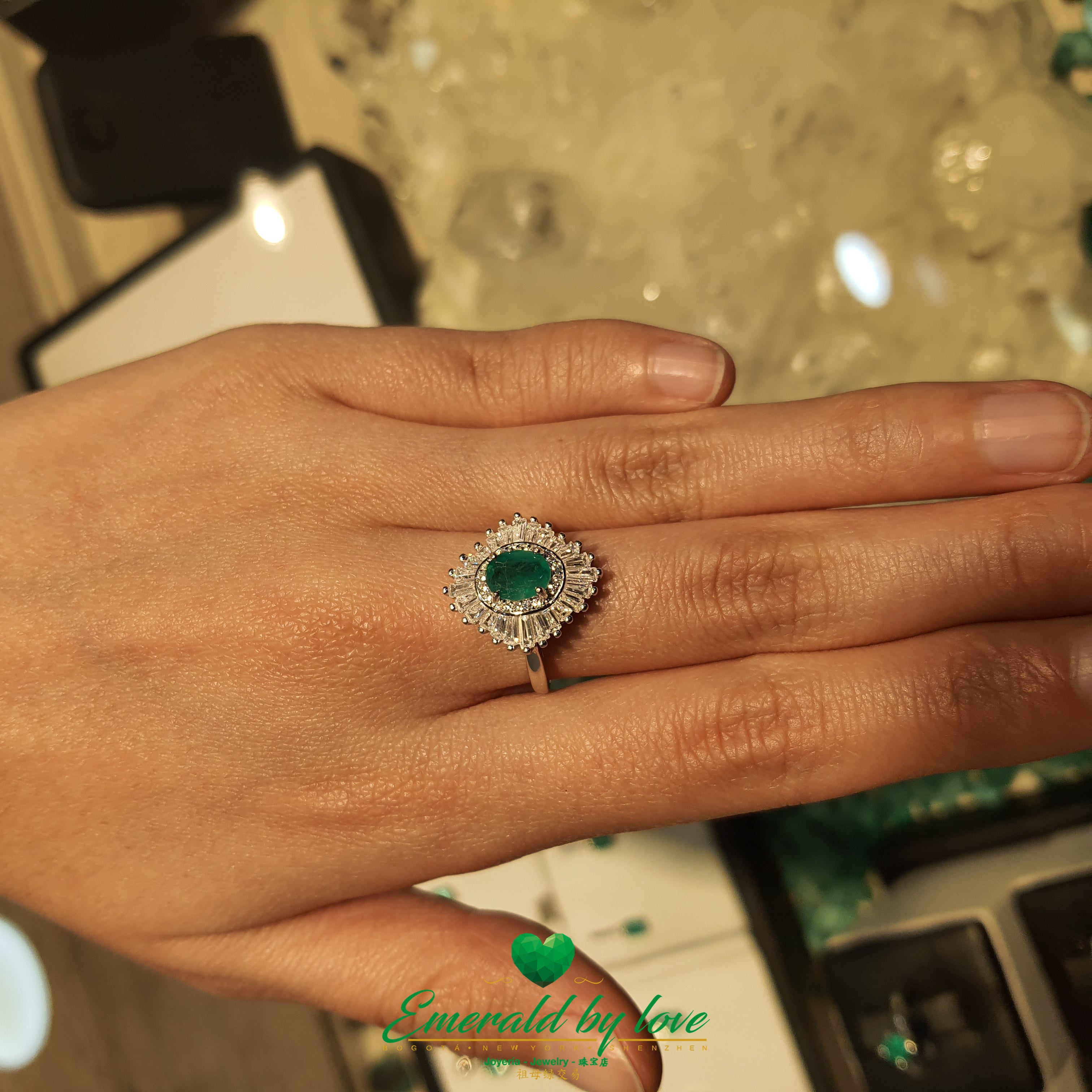 Imperial Marquise Ring with Oval Central Emerald and Baguette CZ Surround: Majestic Elegance