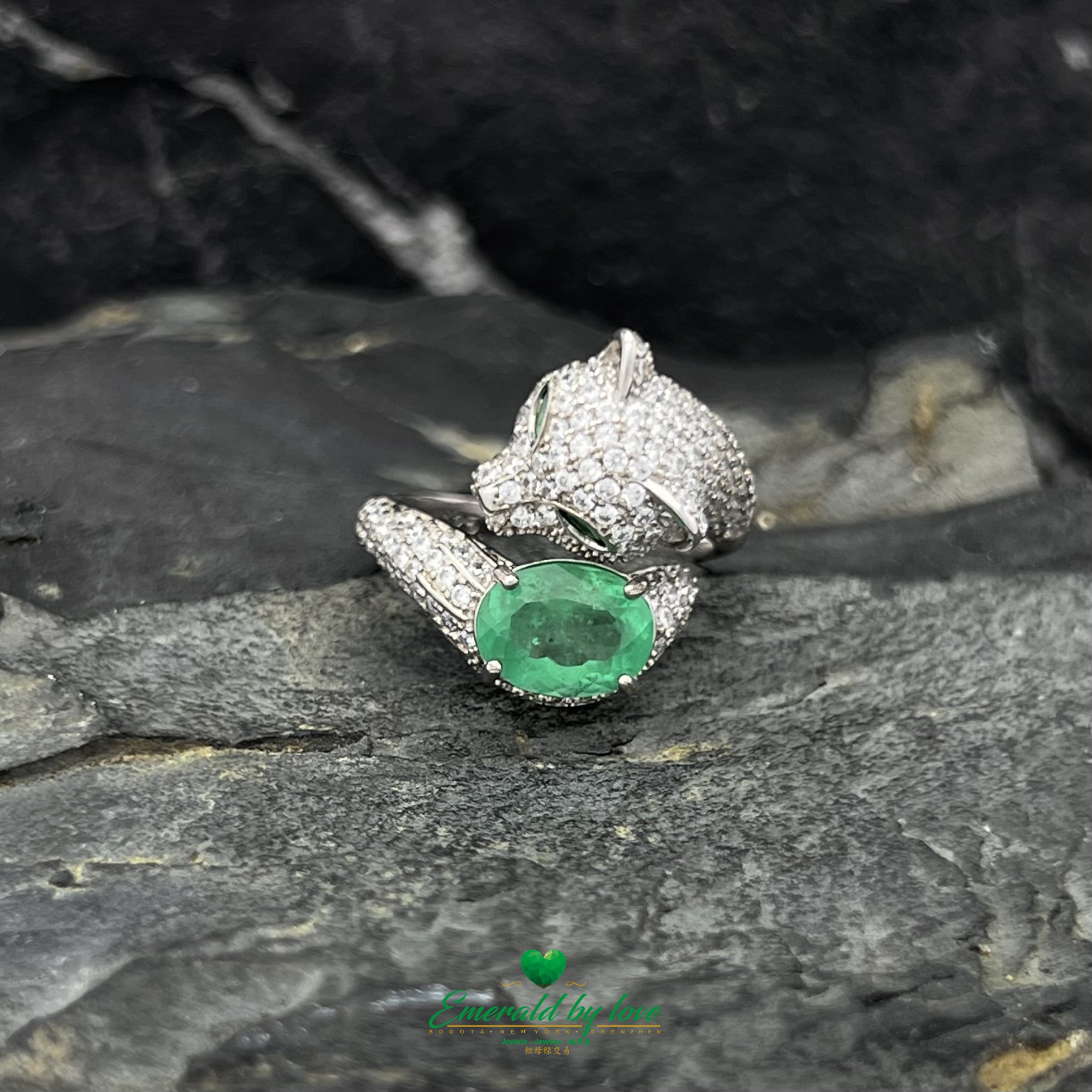 Spiral Panther Design Ring with Oval Emerald Accent