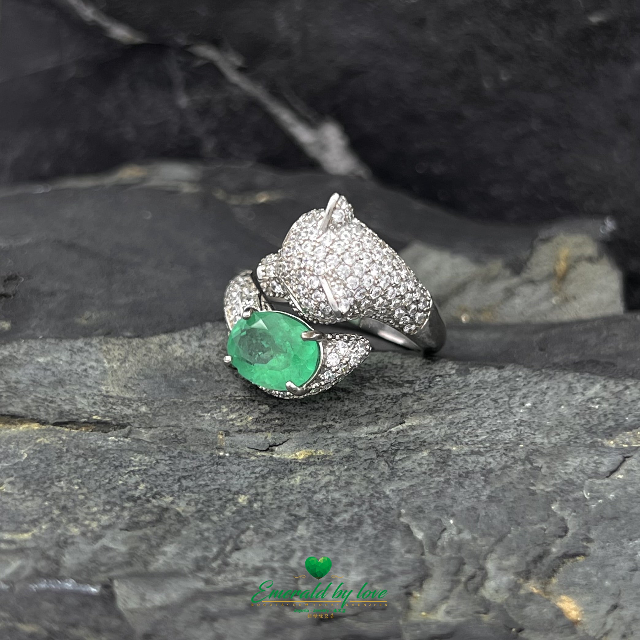 Spiral Panther Design Ring with Oval Emerald Accent