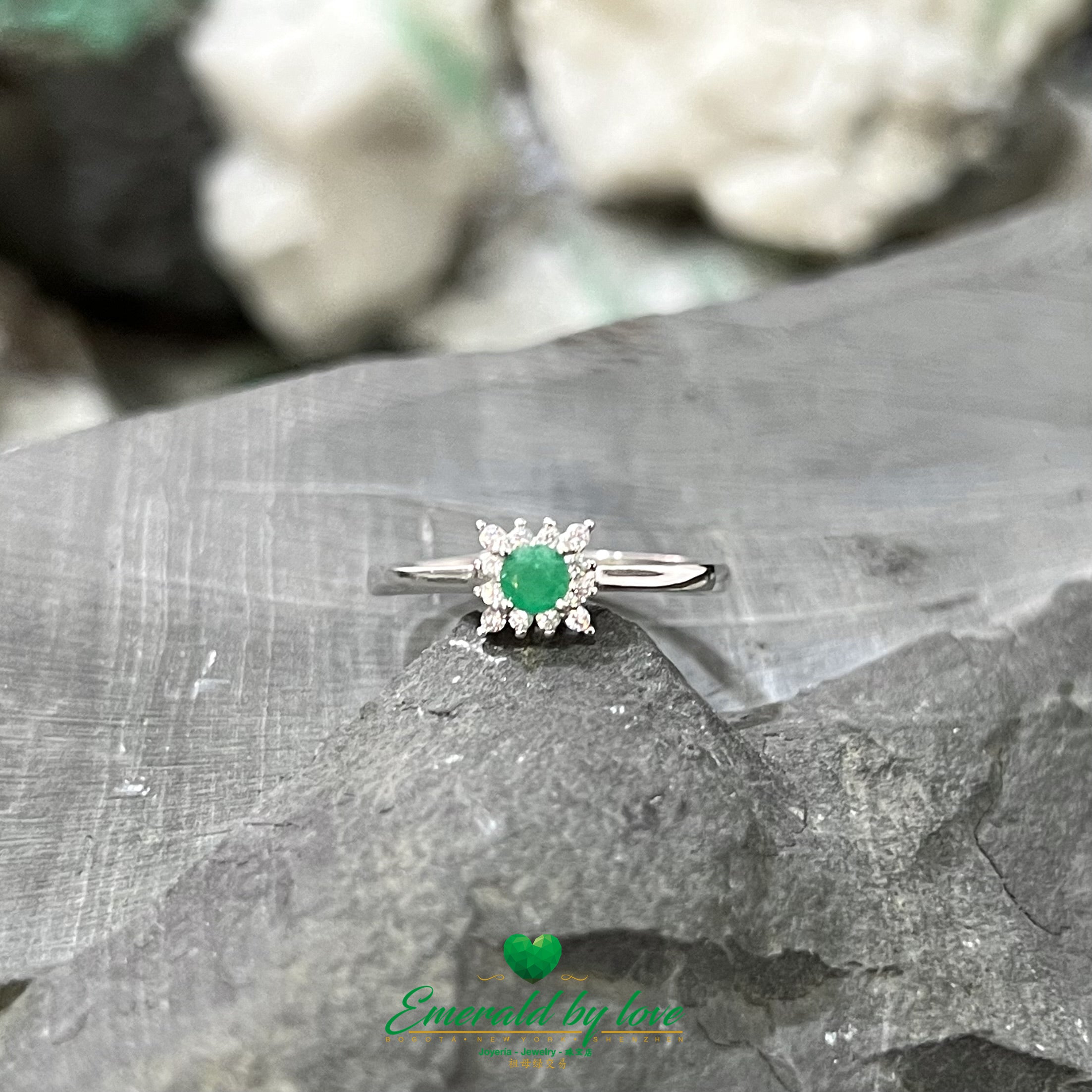 Four-Petal Silver Flower Ring with Central Emerald and Zirconia Accents