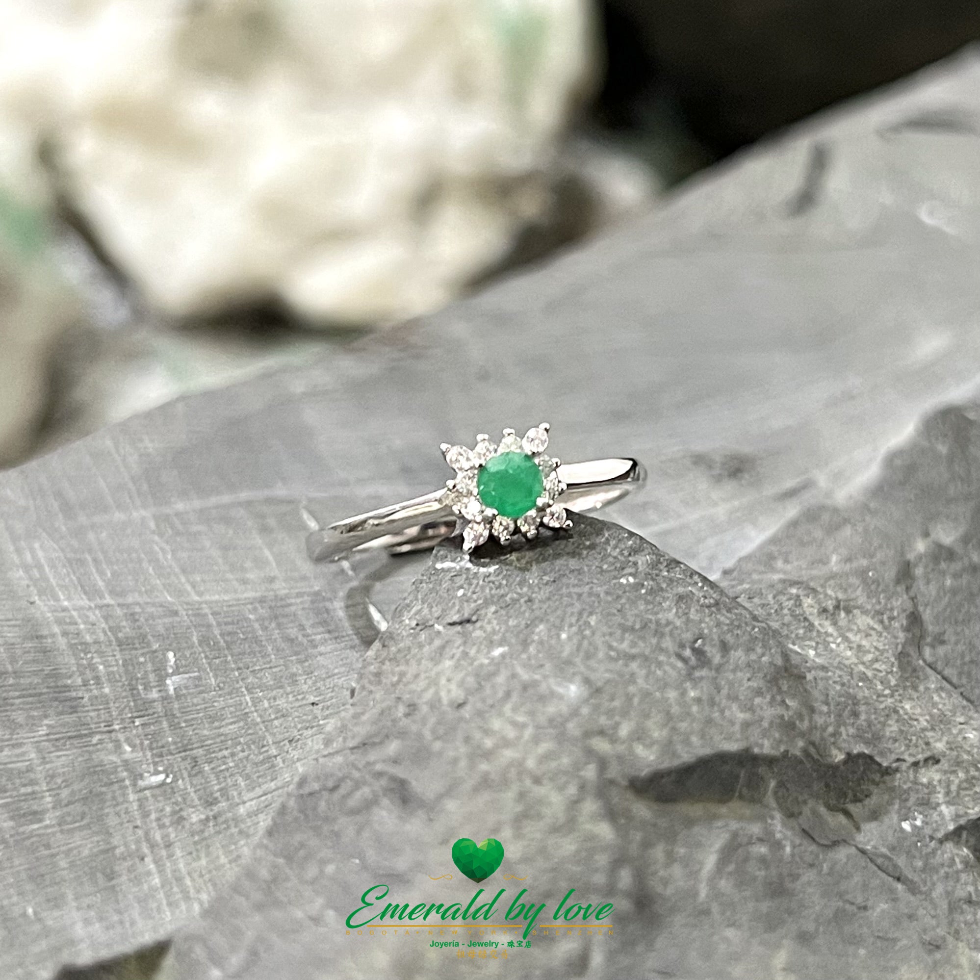 Four-Petal Silver Flower Ring with Central Emerald and Zirconia Accents