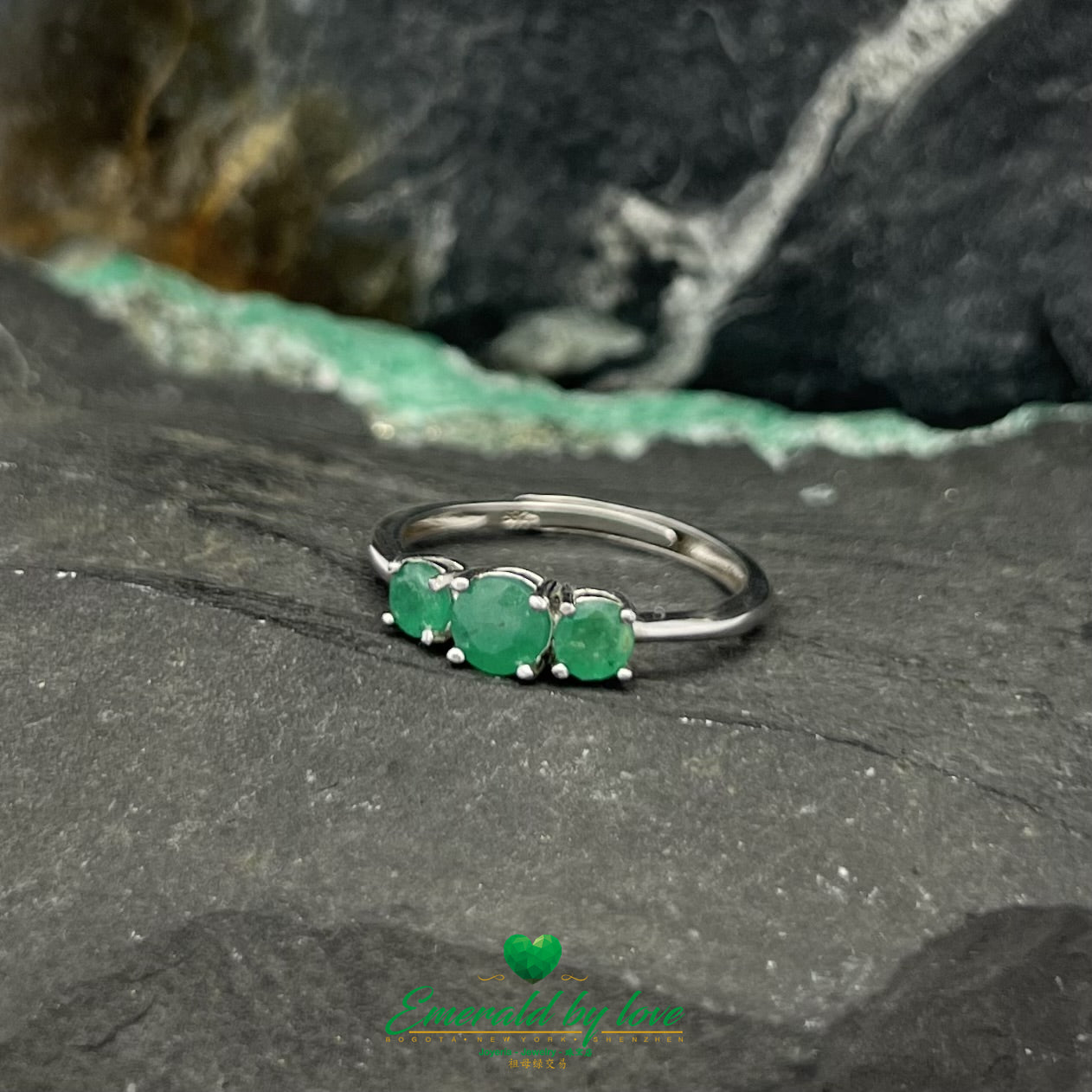 925 Sterling Silver Ring with Three Central Round Emeralds