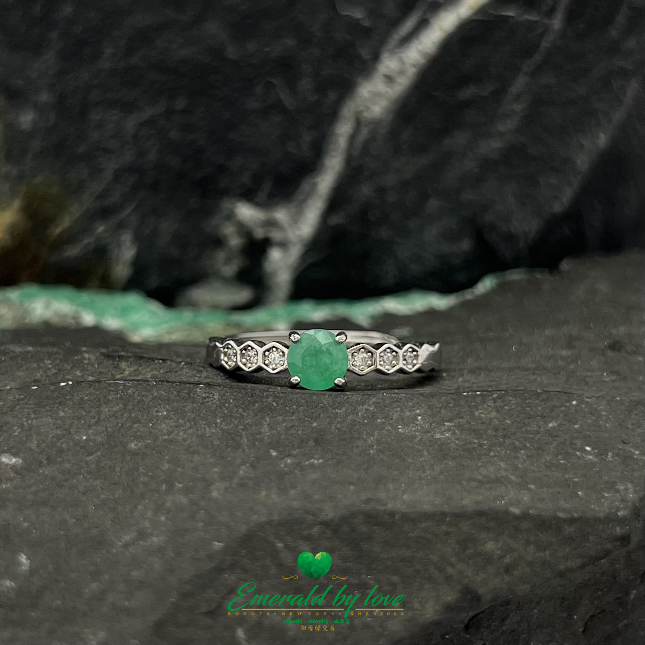 Round Emerald Engagement Ring with Decorative Zirconia Accents