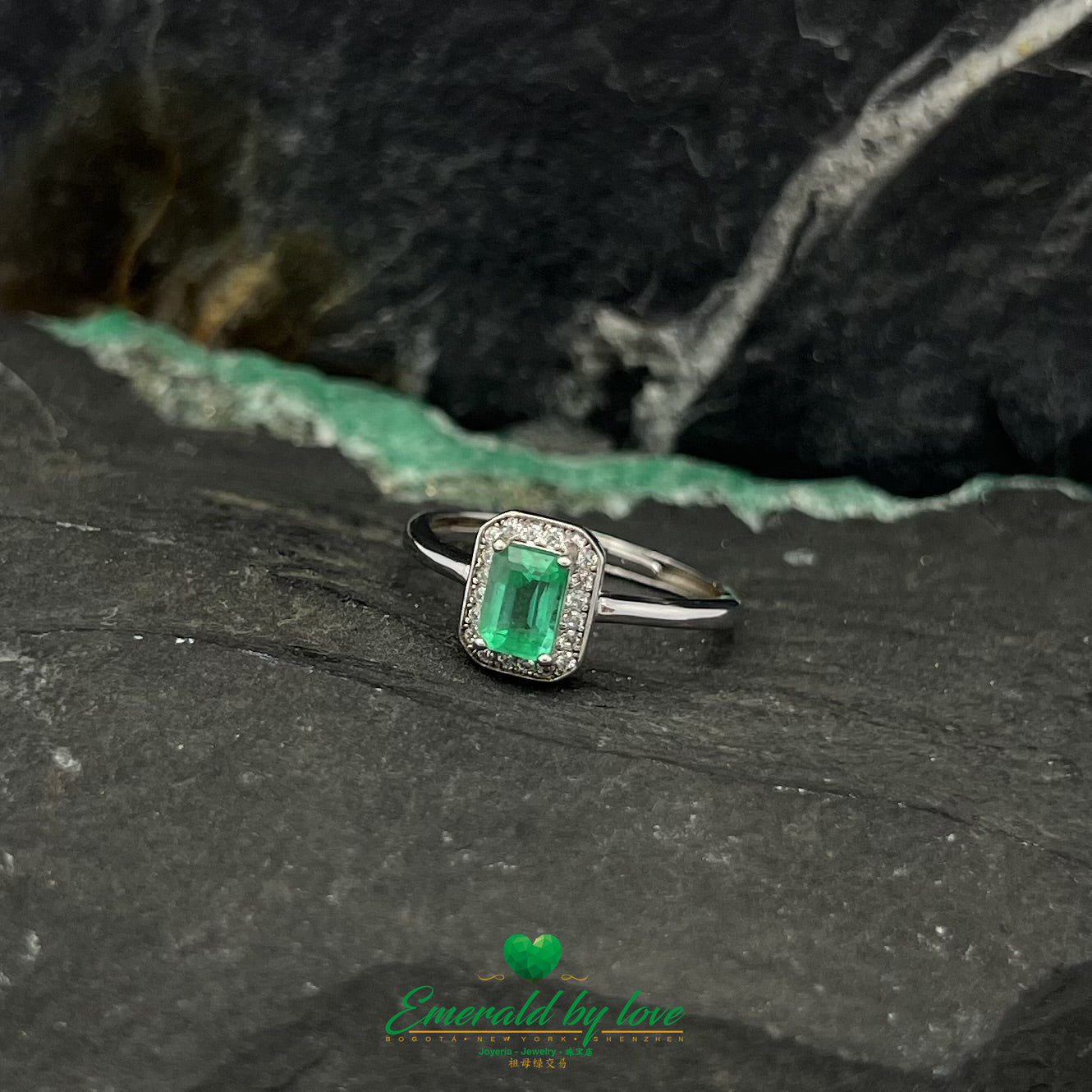 Rectangular Emerald Marquise Ring with Surrounding Zircons
