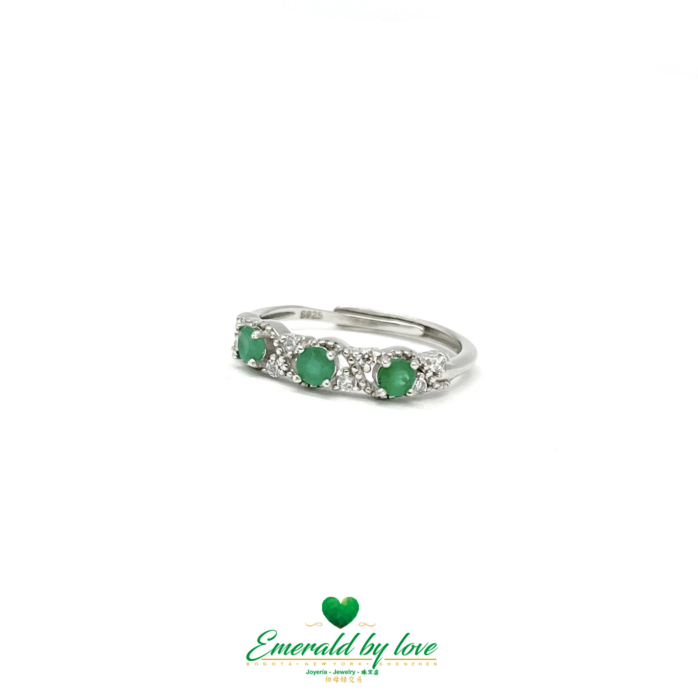Curved Silver Band Ring with Interspersed Emeralds and Zirconia Accents