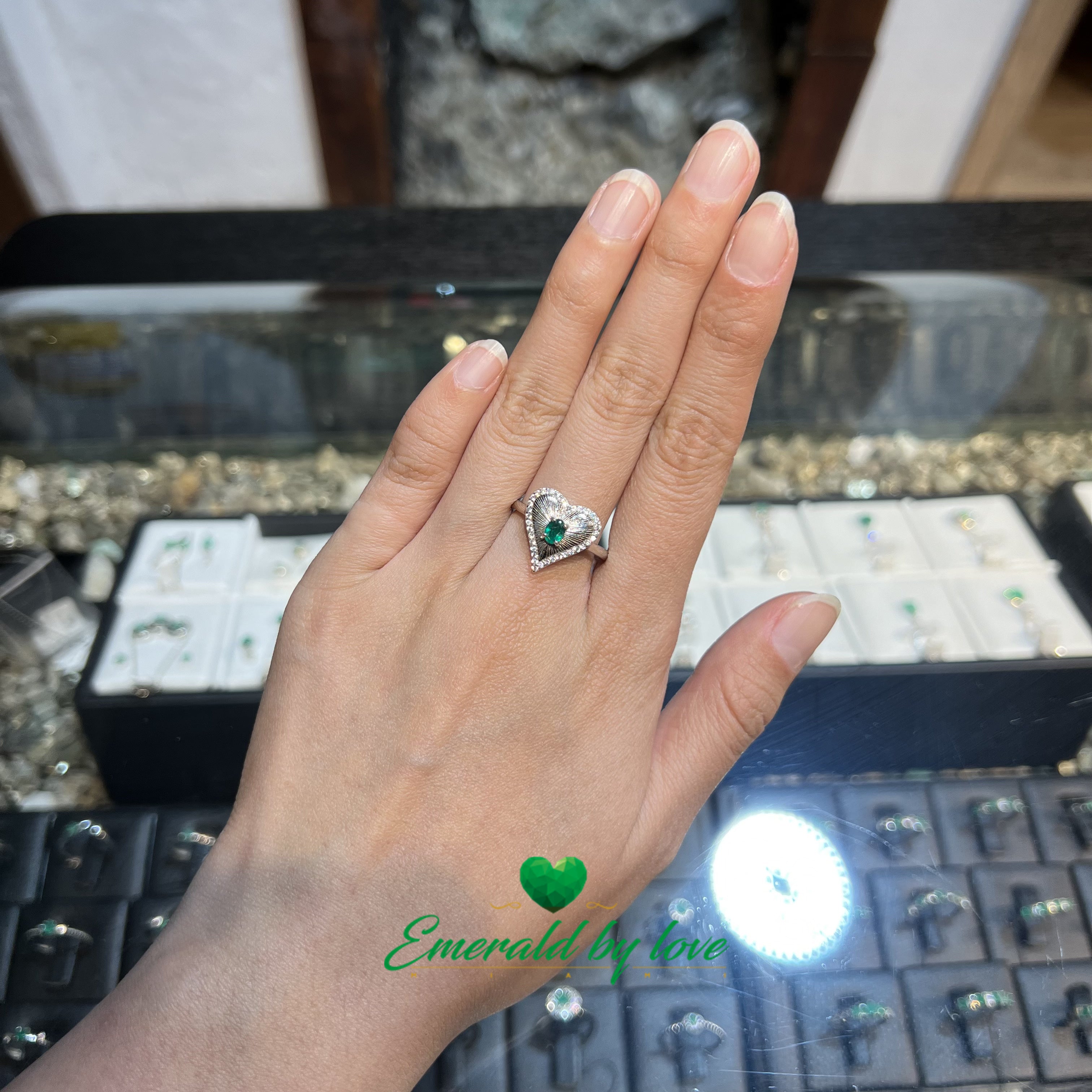 Heart Relief Ring with Oval Emerald and Sparkling Zirconia Accents