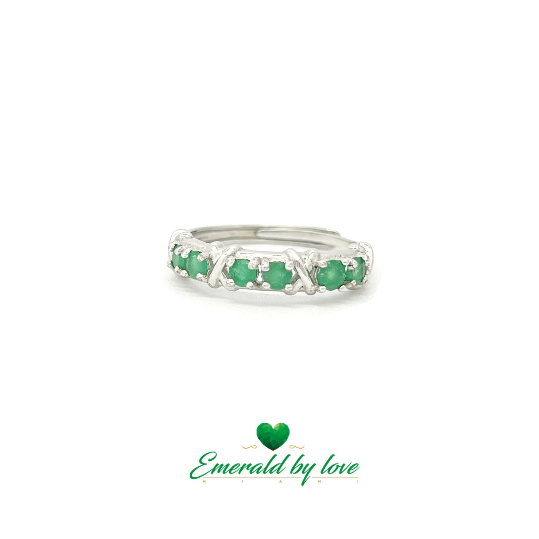 Elegant Band Ring with Six Round Emeralds in Pairs