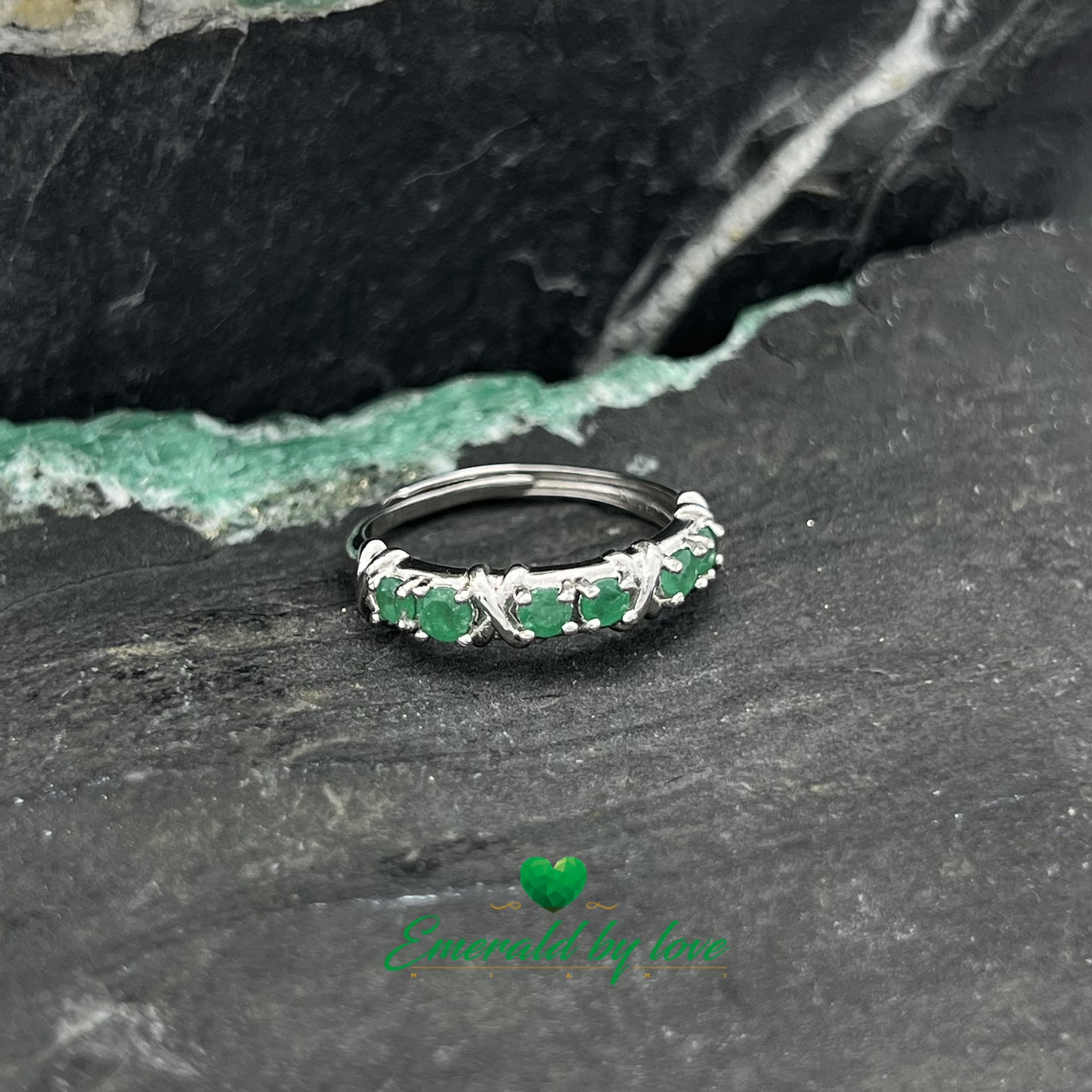 Elegant Band Ring with Six Round Emeralds in Pairs