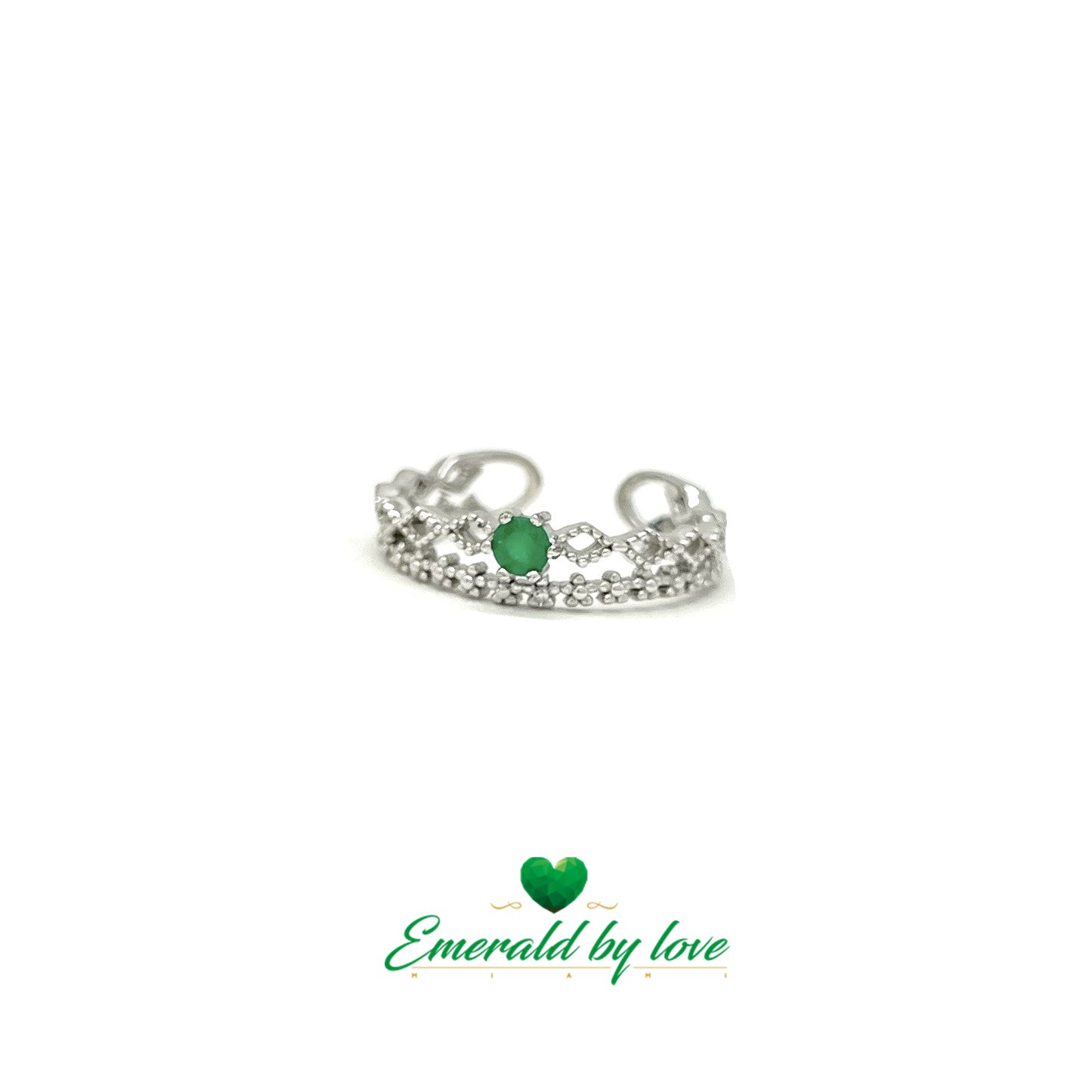 Decorative Silver Ring with Arabesque and Floral Designs Featuring Central Round Emerald