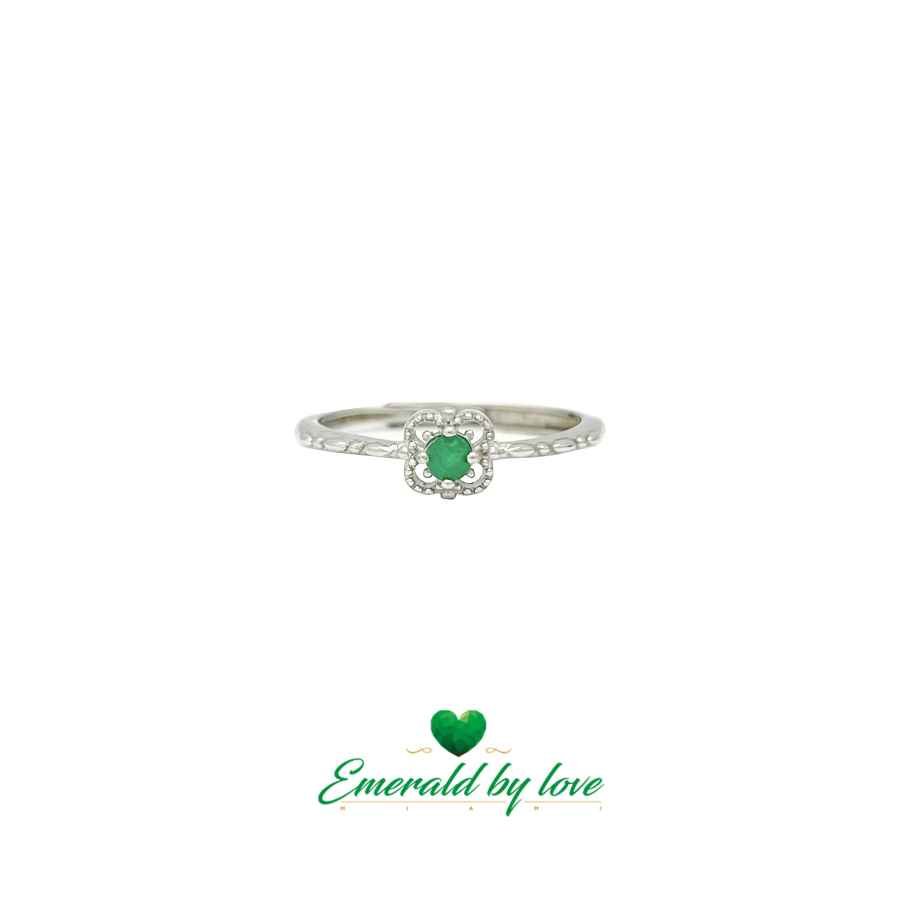 Delicate Silver Ring with Round Emerald and Four-Petal Floral Design