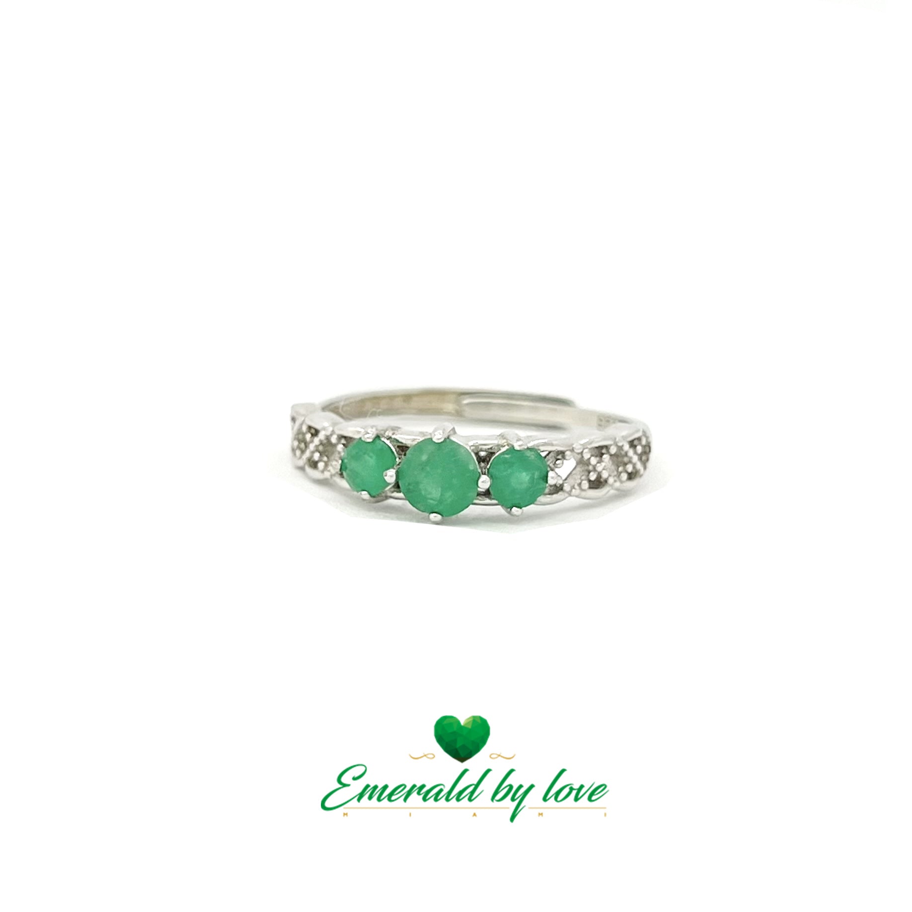 Elegant Semi-Band Ring with Three Central Emeralds