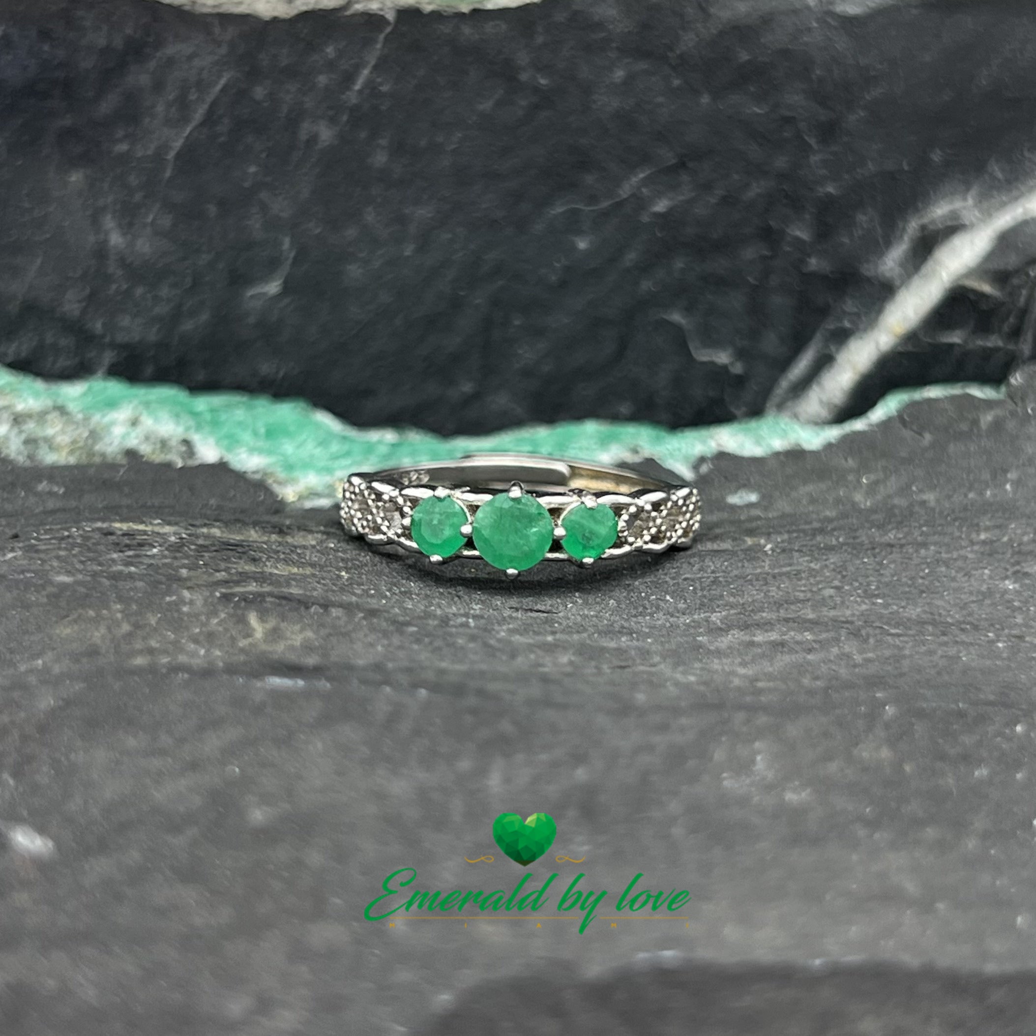 Elegant Semi-Band Ring with Three Central Emeralds