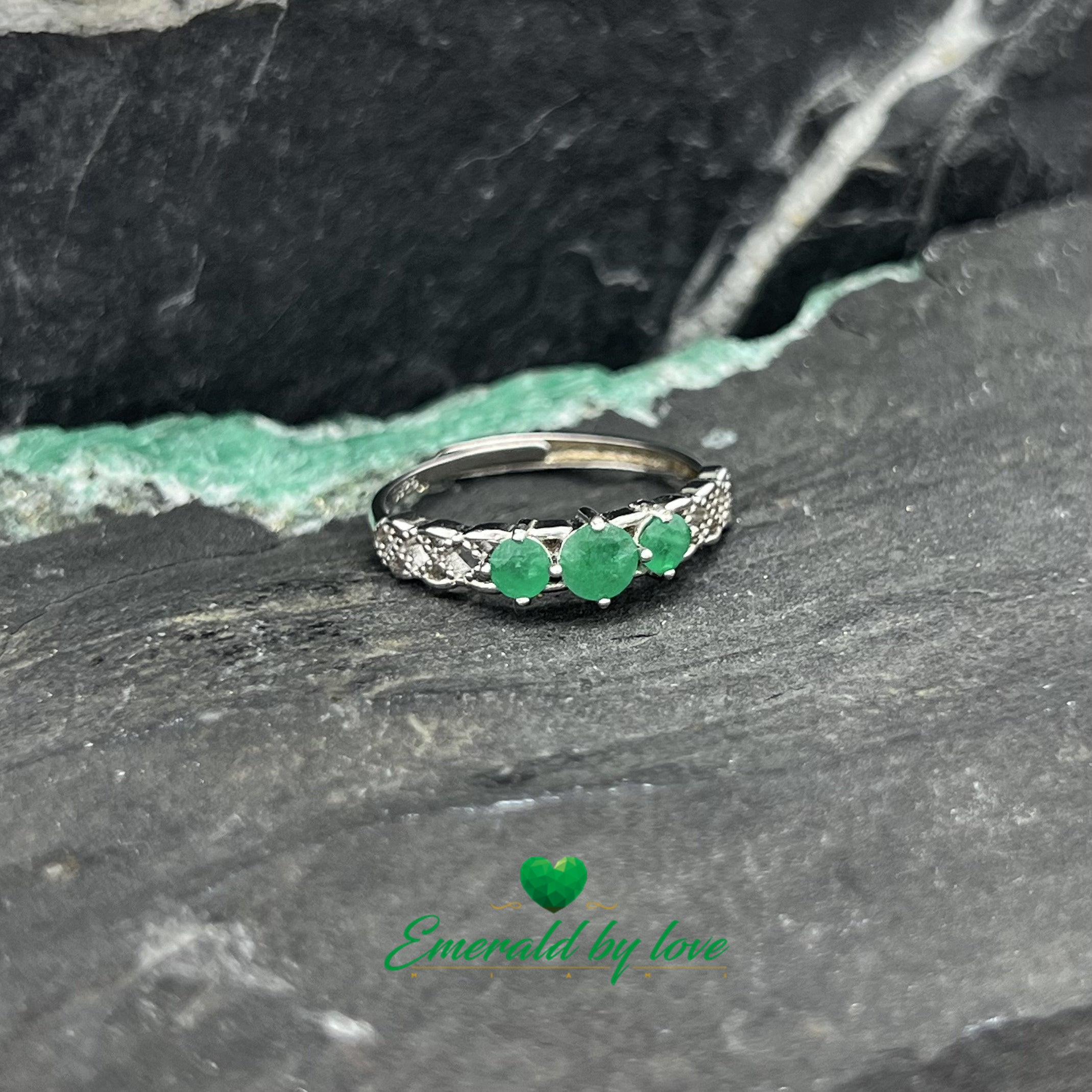 Elegant Semi-Band Ring with Three Central Emeralds