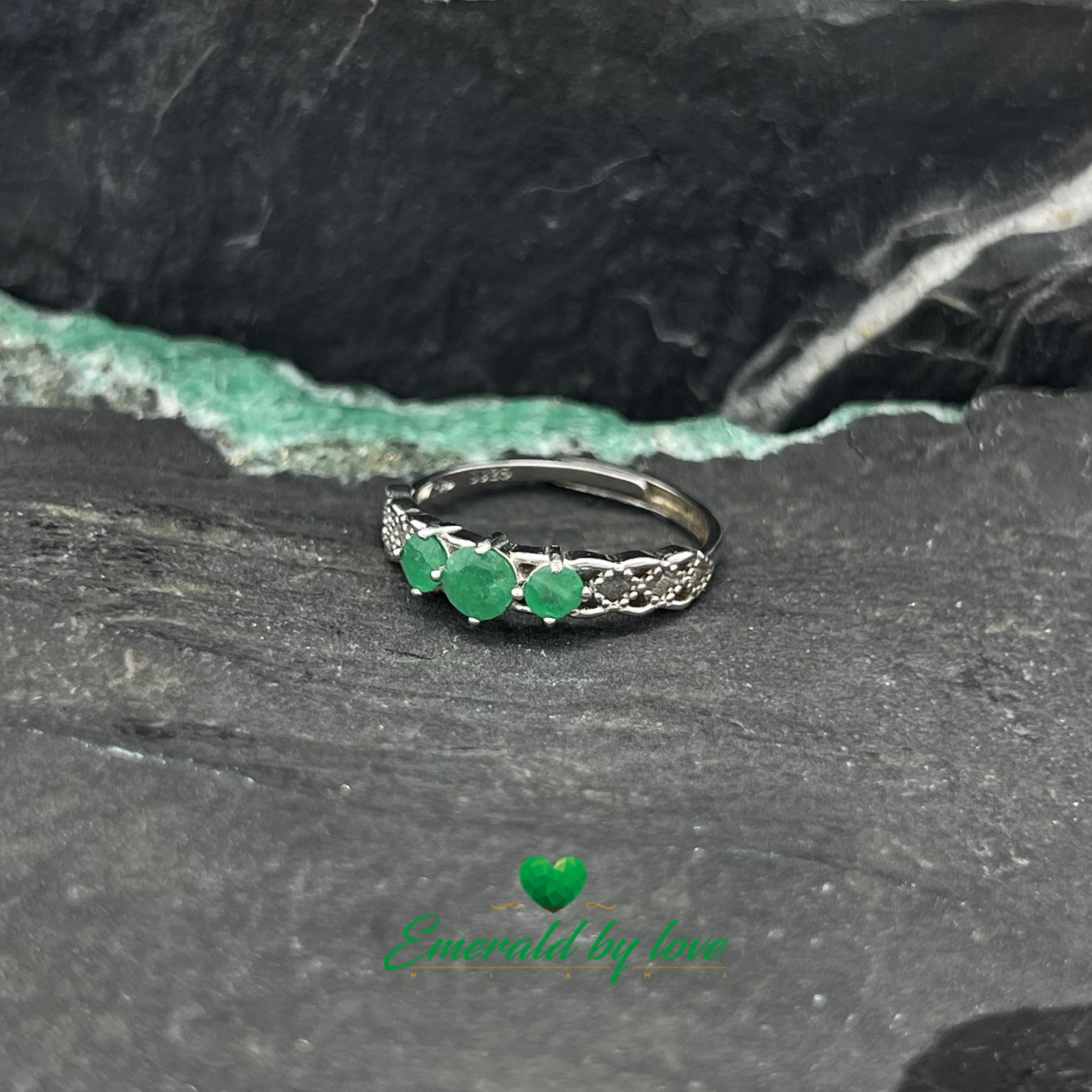 Elegant Semi-Band Ring with Three Central Emeralds