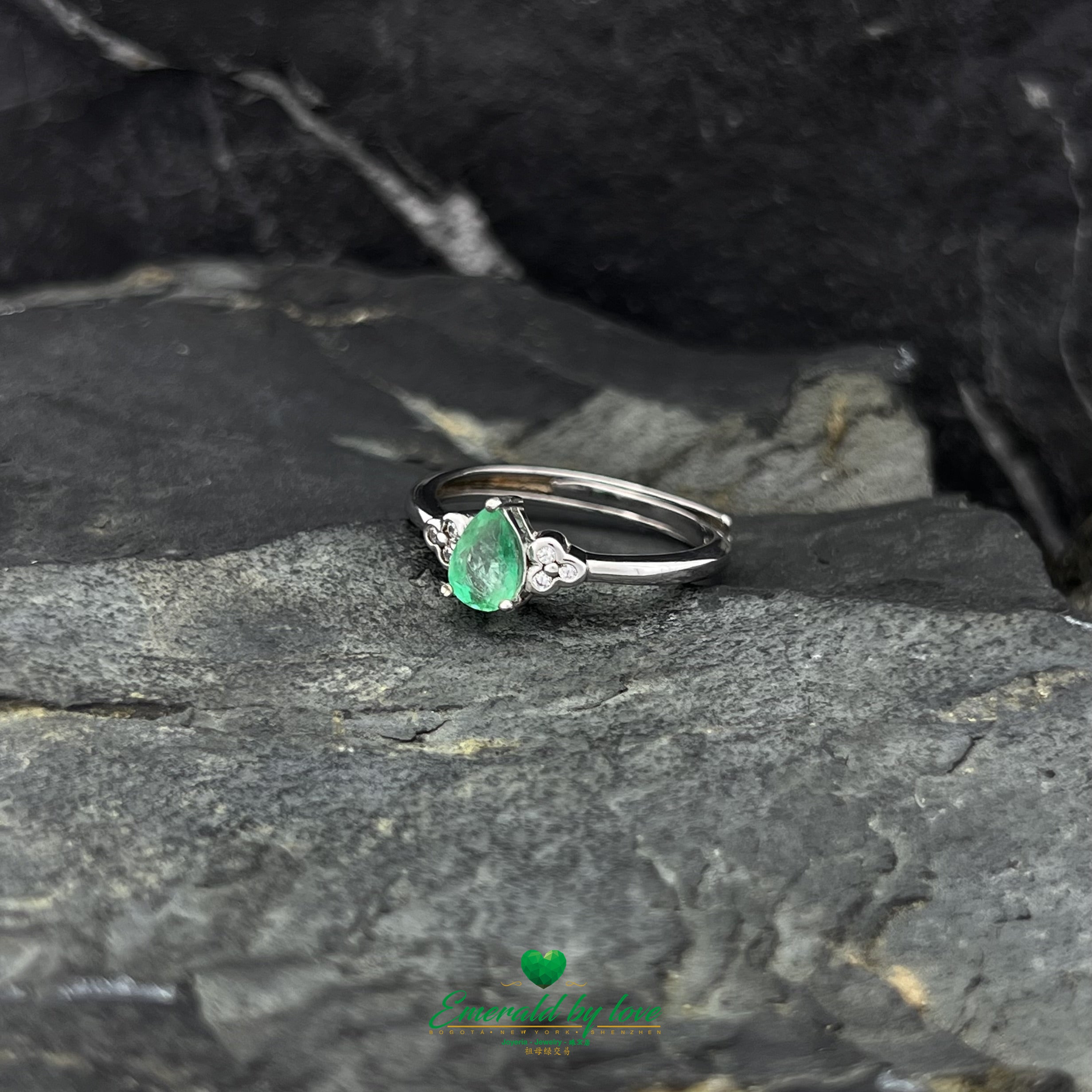 Ring with Central Teardrop Emerald and Zircon Flower Accents