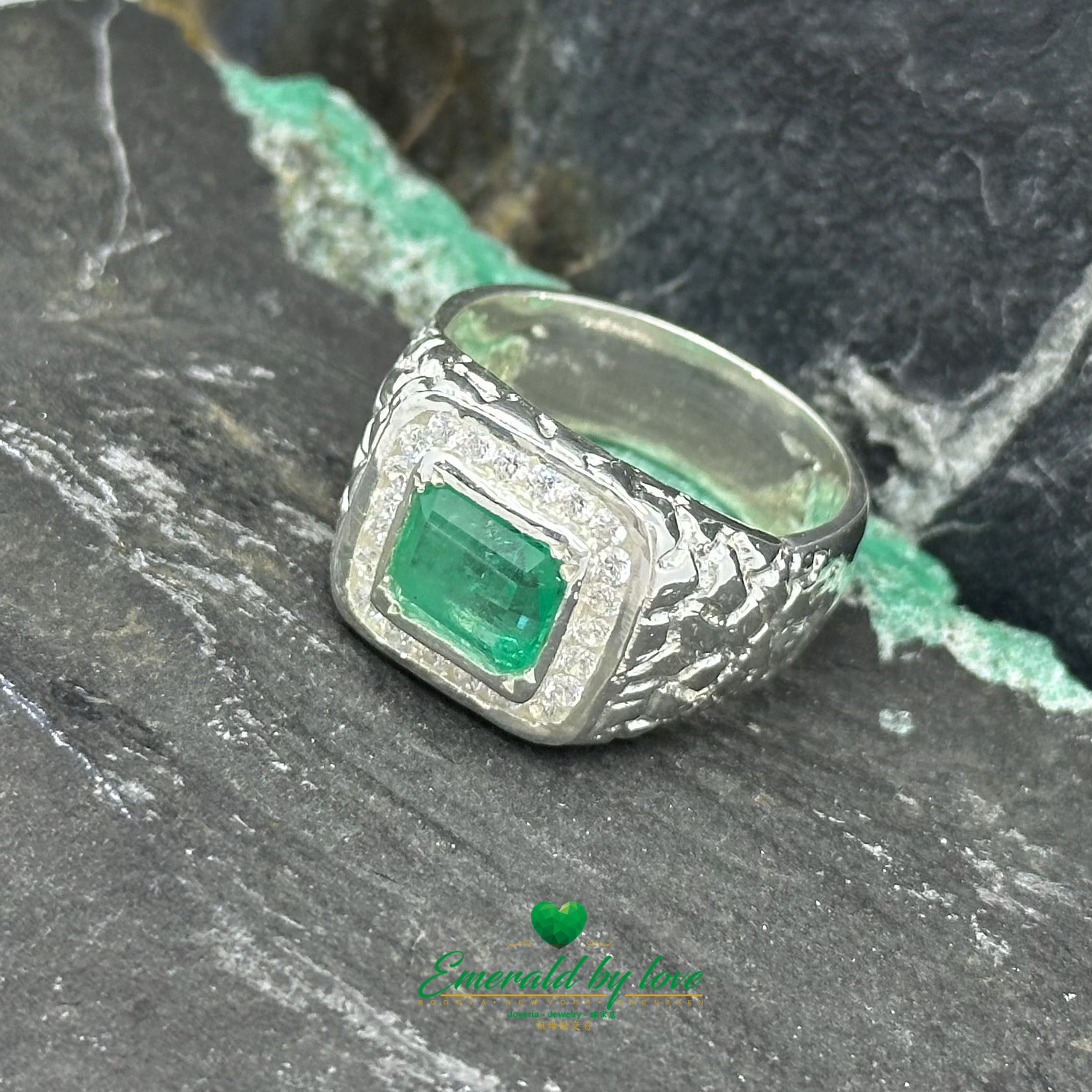 Men's Ring with Closed Bezel-Set Emerald and Surrounding Round Zircons