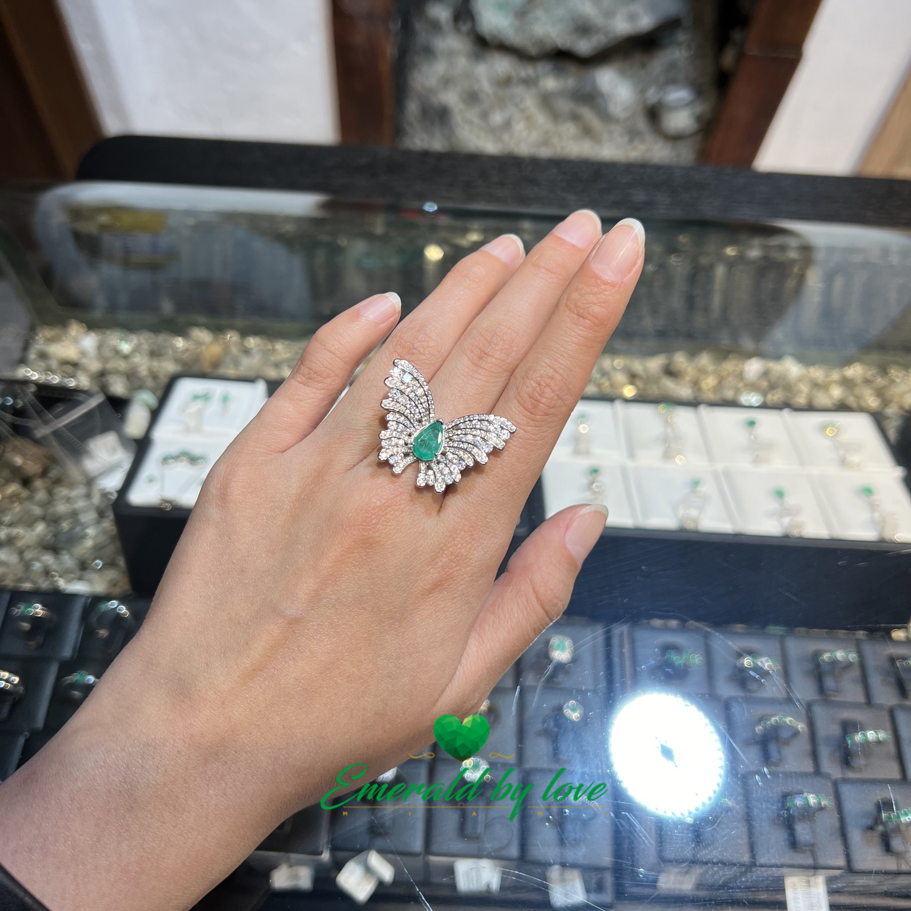 Statement Butterfly Ring with Pear-Shaped Central Emerald and White Zircon Accents