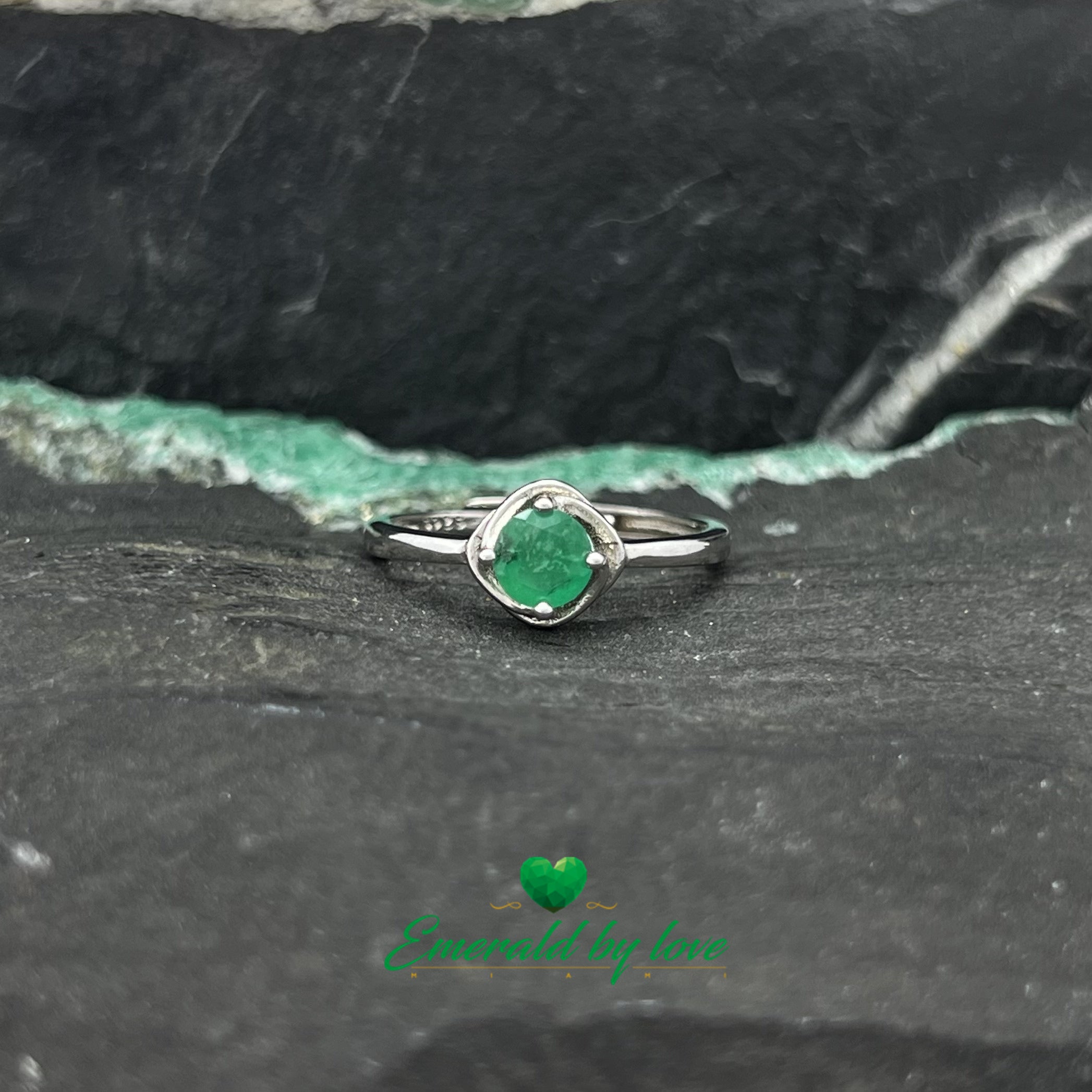 Solitaire Ring with Round Emerald and Decorative Arabesque Setting