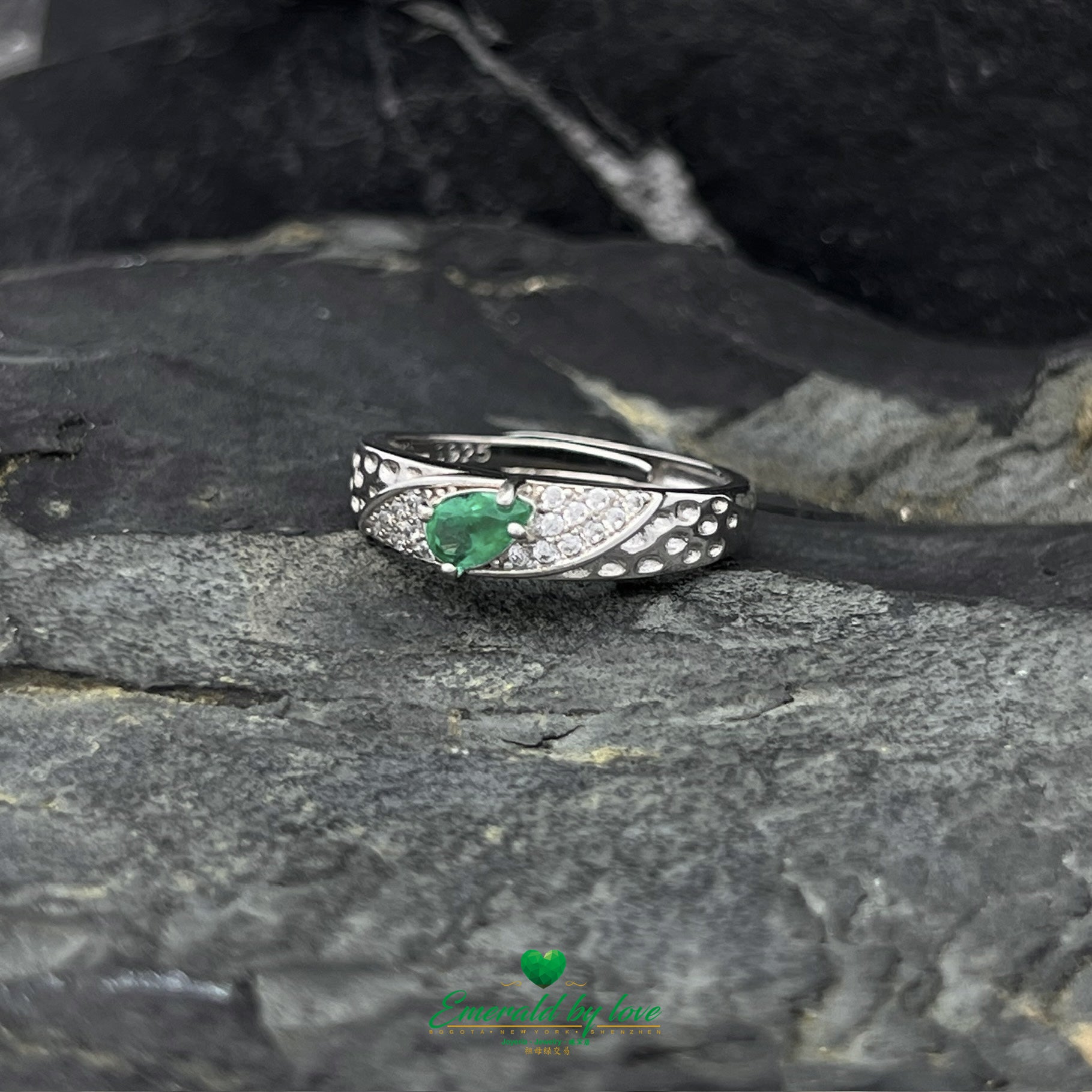 Chunky Silver Ring with Zircons and Diagonal Pear-Shaped Emerald